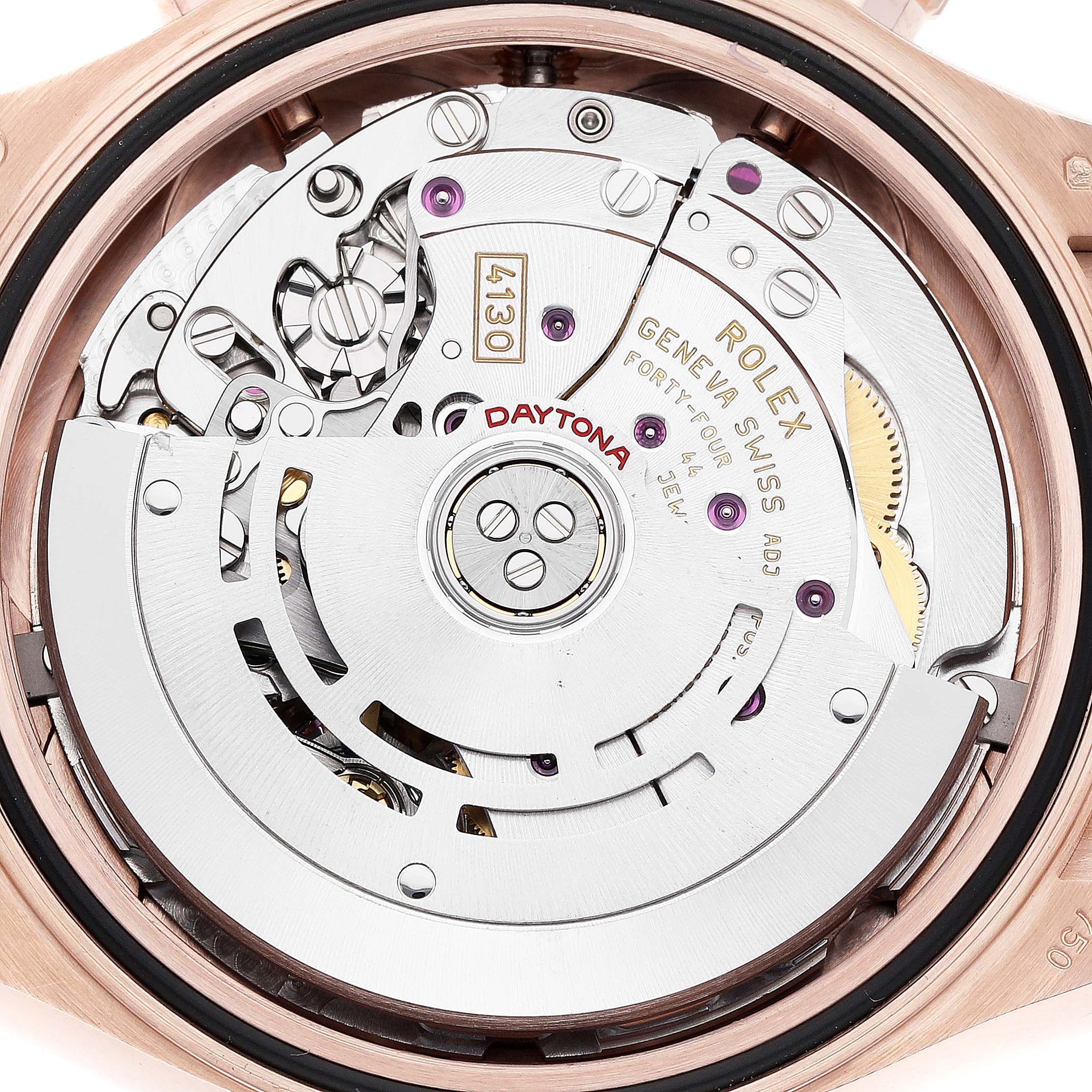 The image shows the movement of a Rolex Daytona 116515LN Men's Rose Gold Brown Dial watch from a top-down angle, highlighting its intricate mechanical parts.
