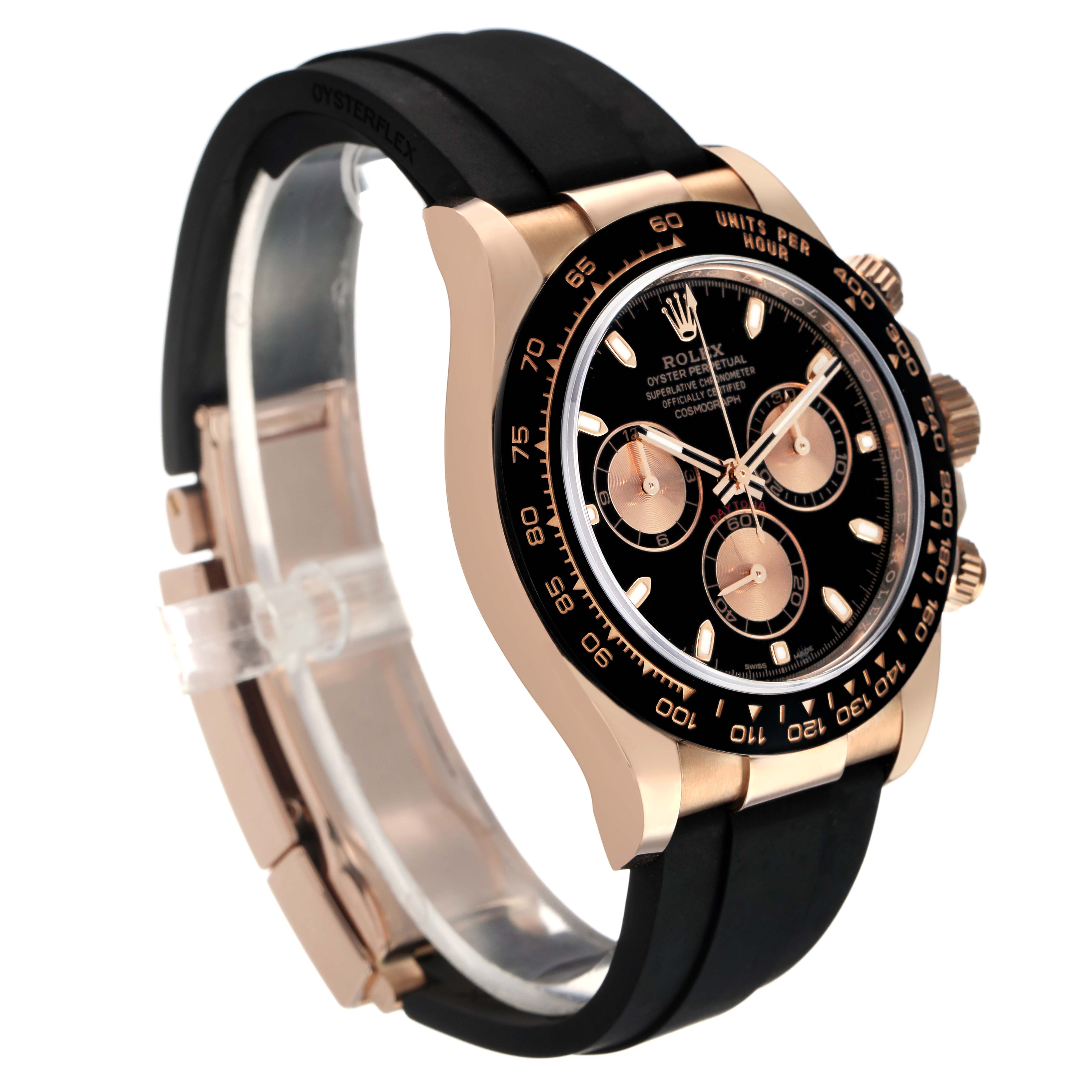 The Rolex Daytona 116515LN Men's Rose Gold Brown Dial watch is shown at an angle displaying the face, bezel, and rubber strap.