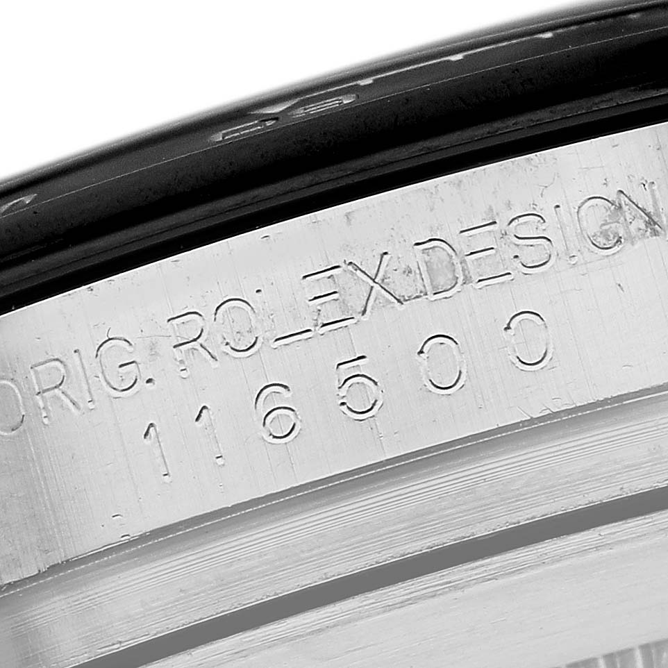 The image shows a close-up of the engraved serial number on the side of a Rolex Daytona 116500LN Men's Stainless Steel White Dial watch case.