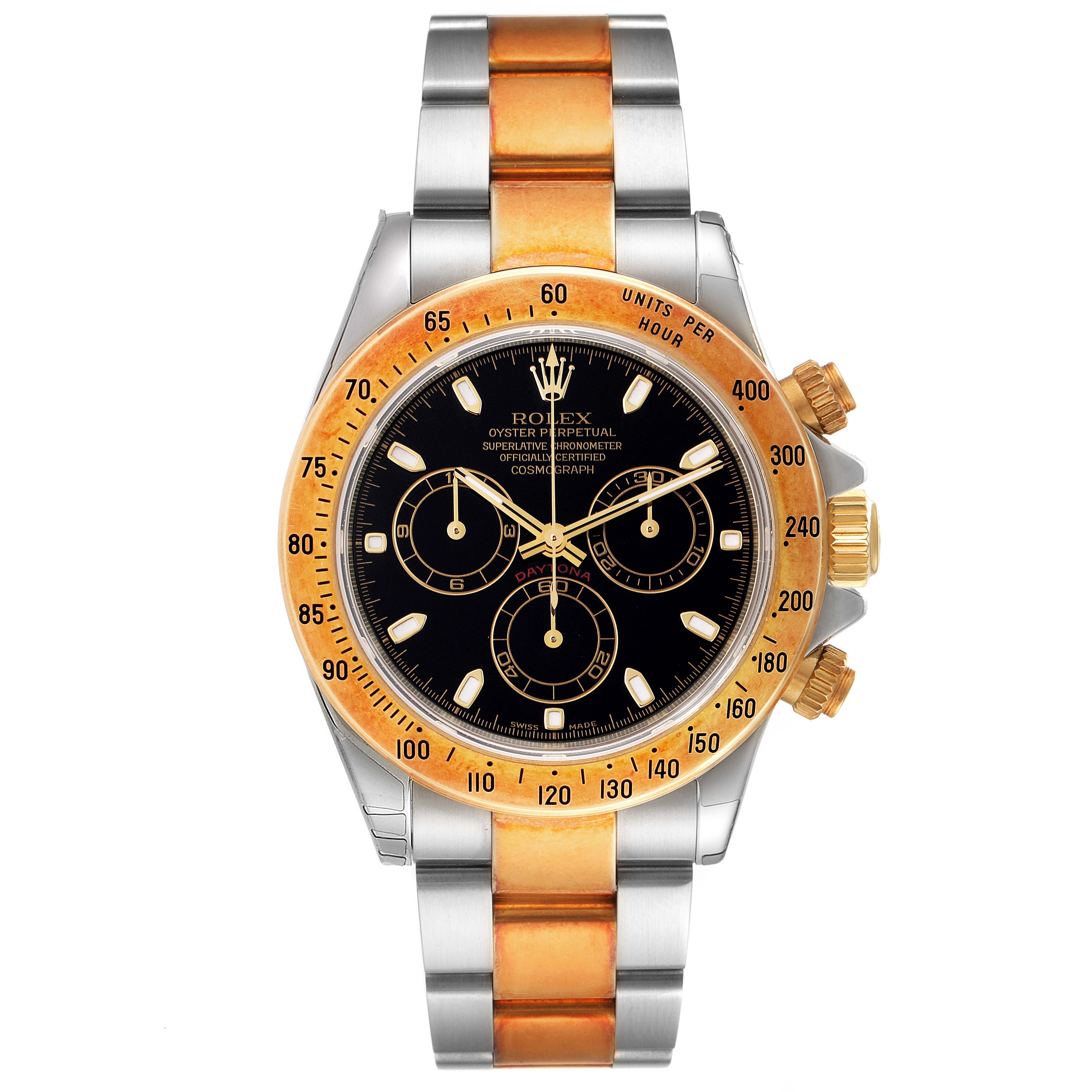 The image shows a frontal view of a Rolex Daytona 116523 Men
s Steel and Gold (two tone) Black Dial 116523 Men
s Steel and Gold (two tone) Black Dial watch, highlighting its dial, bezel, and bracelet.