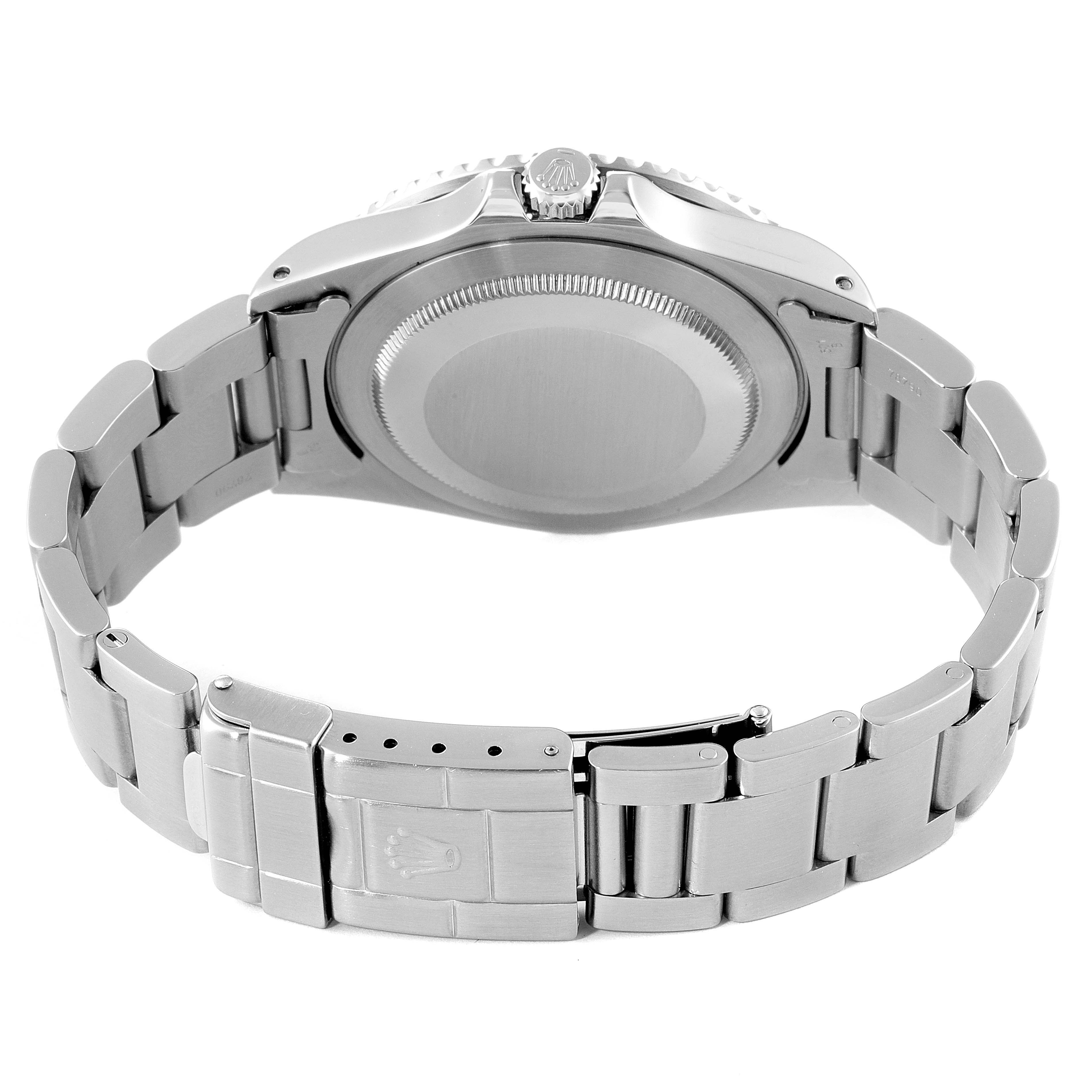 This is a rear view of the Rolex GMT-Master 16700 Men
s Stainless Steel Black Dial 16700 Men
s Stainless Steel Black Dial, showing the case back, crown, and metal bracelet with the clasp.