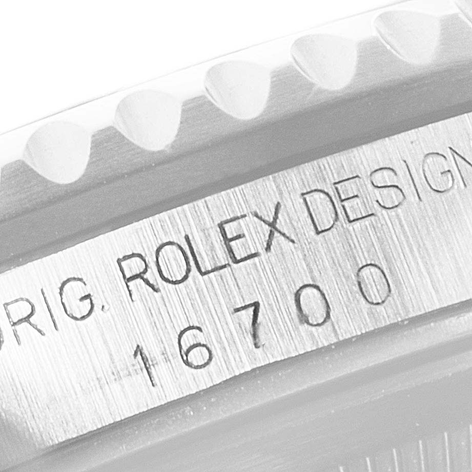 This close-up image shows the side engraving with the model number on a Rolex GMT-Master 16700 Men
s Stainless Steel Black Dial 16700 Men
s Stainless Steel Black Dial 16700.