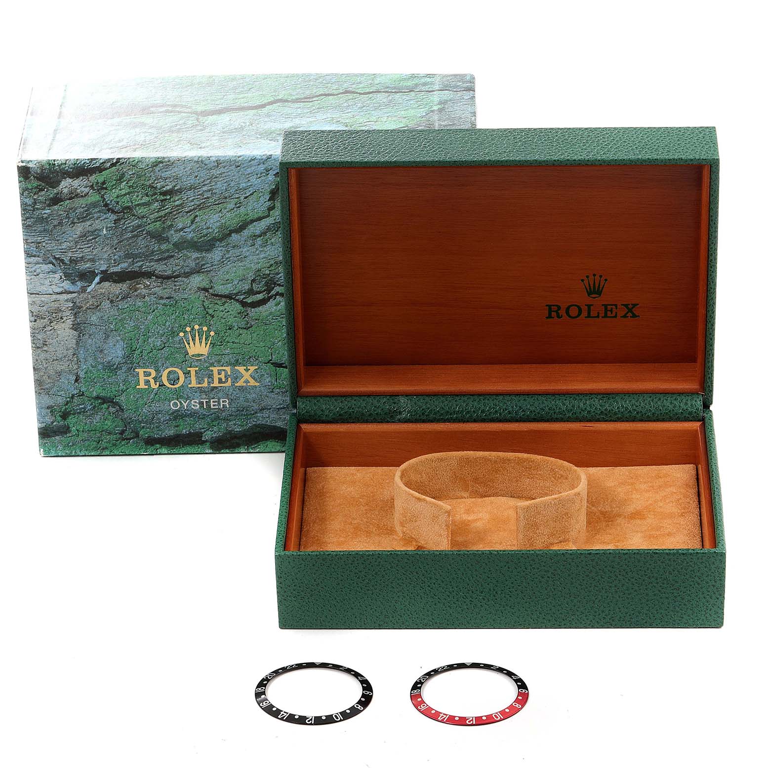 The image shows a green Rolex Oyster box with an interior view and two bezel rings for the GMT-Master model by Rolex.