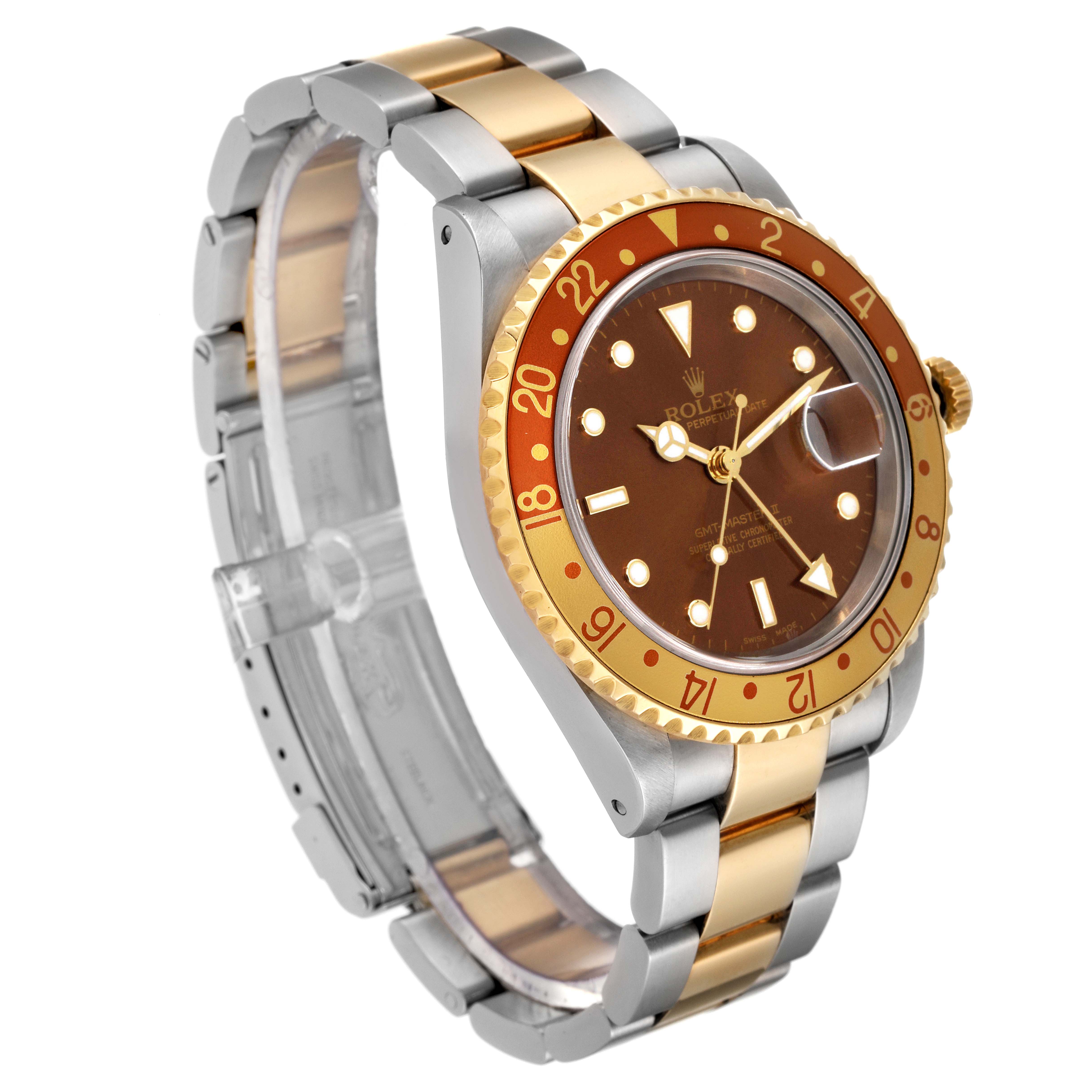 The Rolex GMT-Master 16713 Men's Steel and Gold (two tone) Brown Dial 16713 Men's Steel and Gold (two tone) Brown Dial watch is shown at an angle, highlighting its two-tone bracelet, brown dial, and bezel with gold accents.