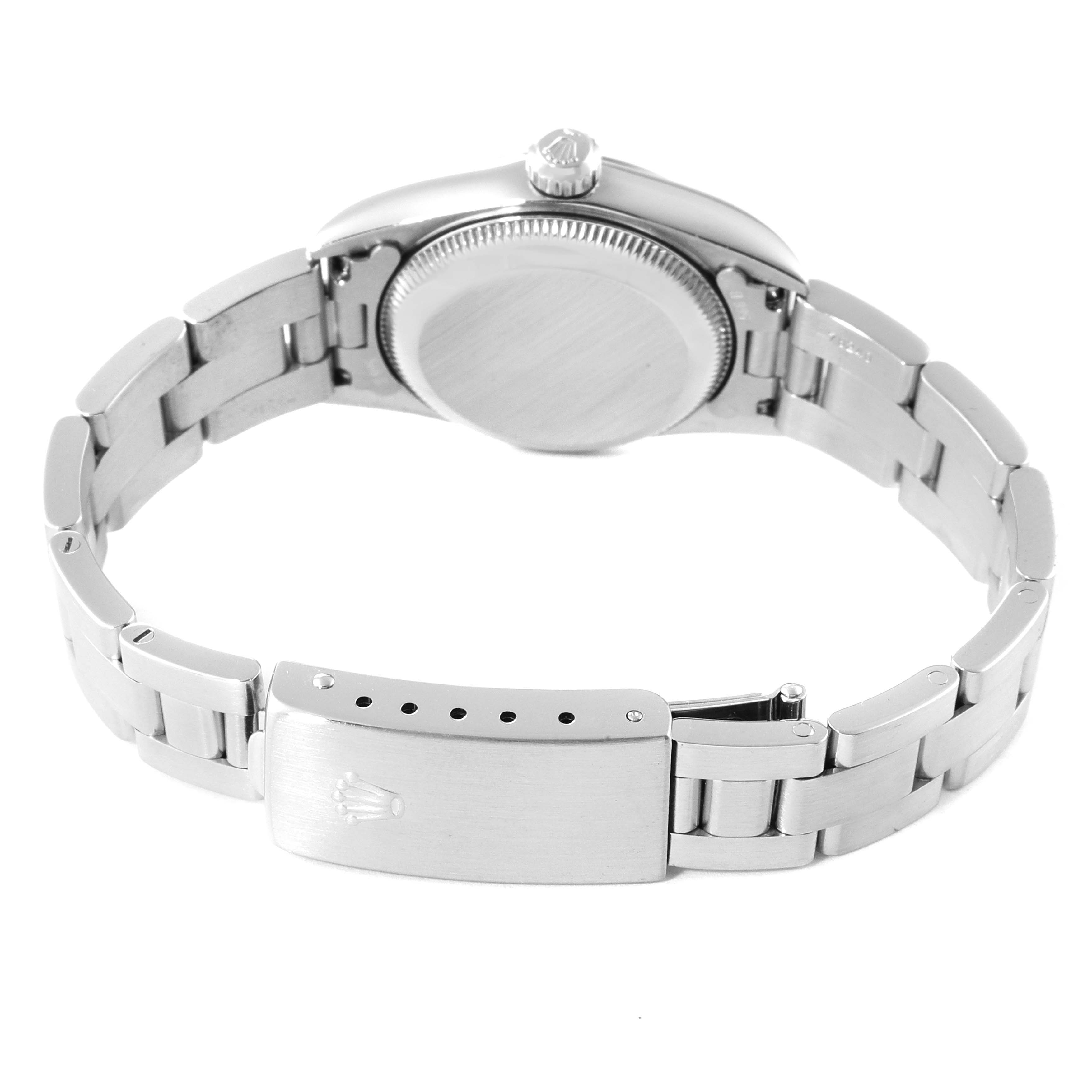 This image shows the back view of a Rolex Oyster Perpetual 76080 Women
s Stainless Steel Pink Dial 76080 Women
s Stainless Steel Pink Dial watch, highlighting its caseback, bracelet, and clasp.