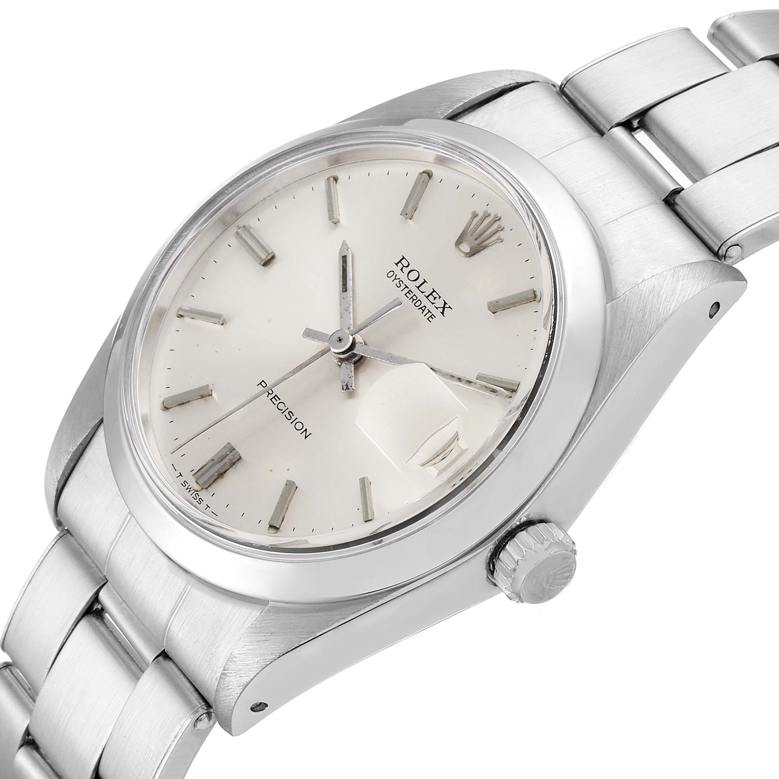 The image shows a Vintage Collection Rolex Oyster Perpetual watch at a three-quarter angle, displaying the dial, case, crown, and bracelet.
