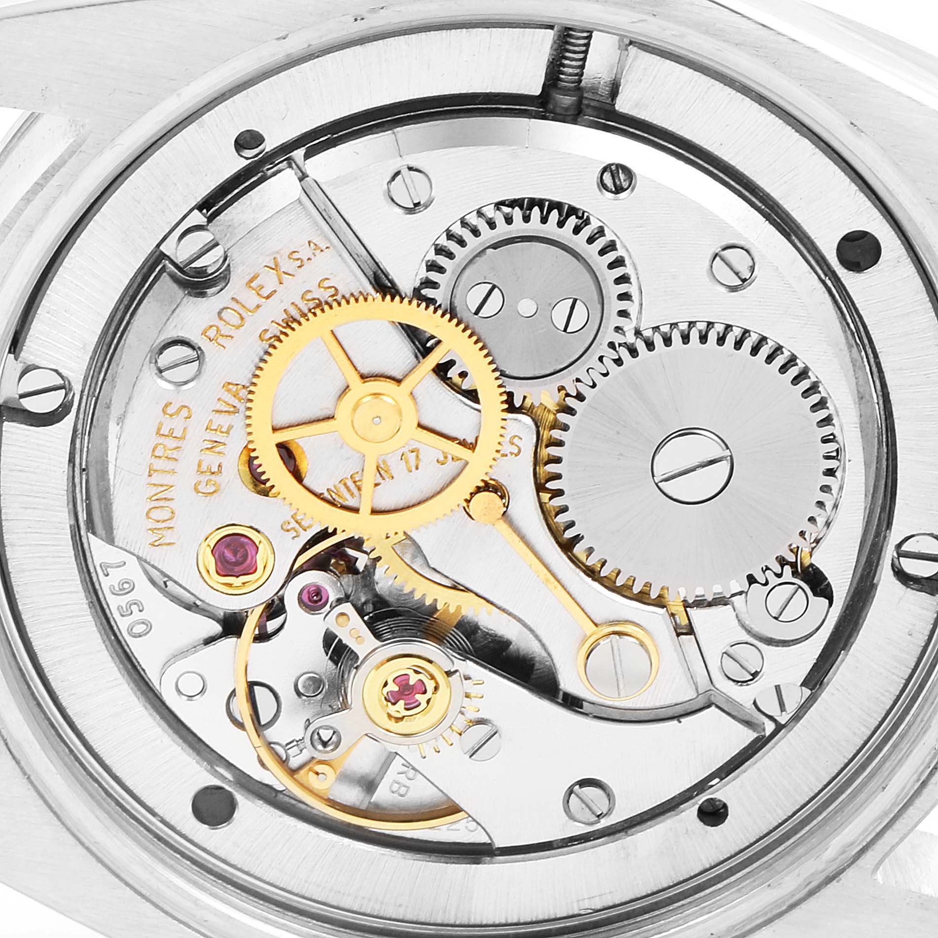 This close-up image shows the intricate mechanical movements and gears of the Vintage Collection model by Rolex.