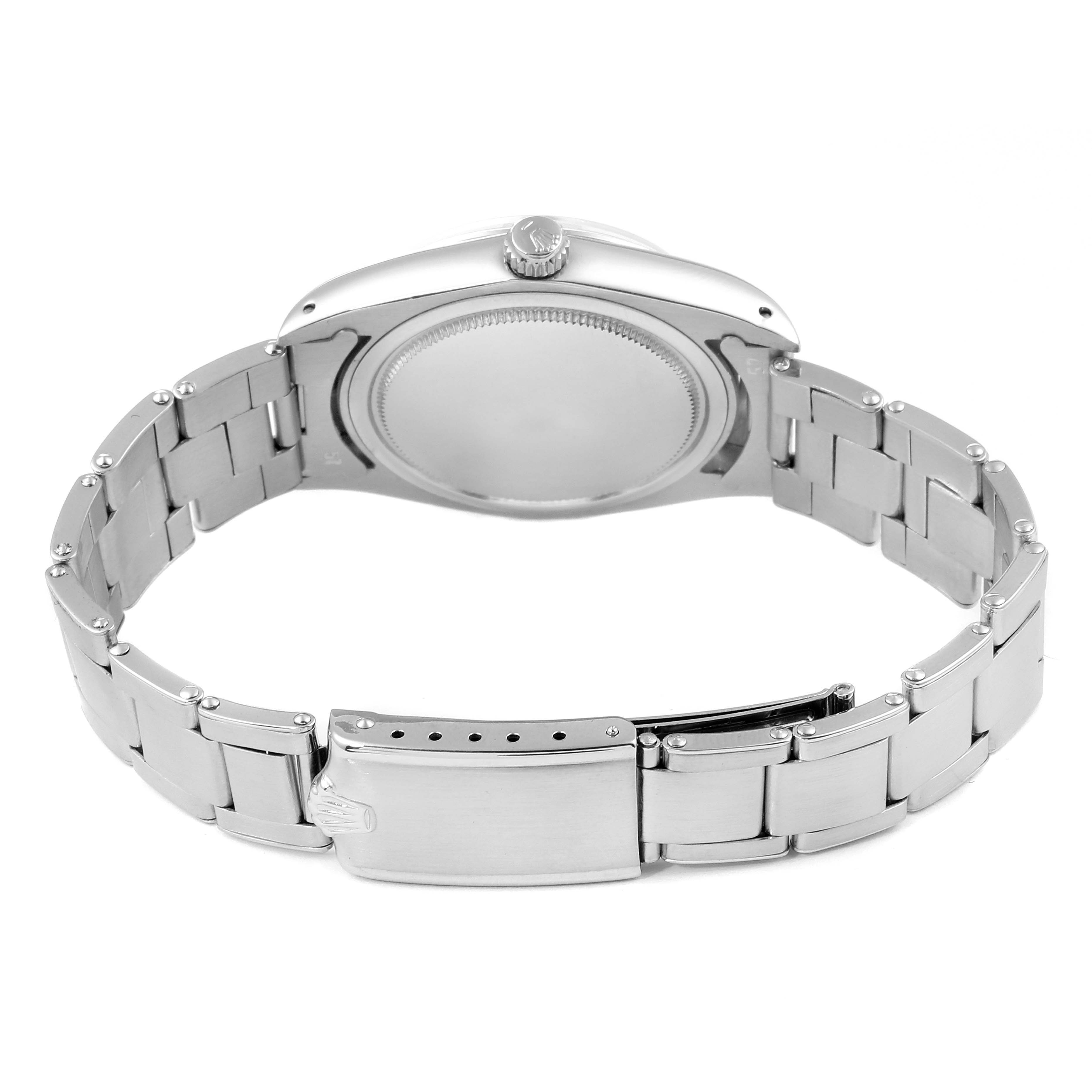 This image shows the back casing and partially opened clasp of a Rolex Vintage Collection 6694 Men's Stainless Steel Silver Dial 6694 Men's Stainless Steel Silver Dial watch from an angled rear view.