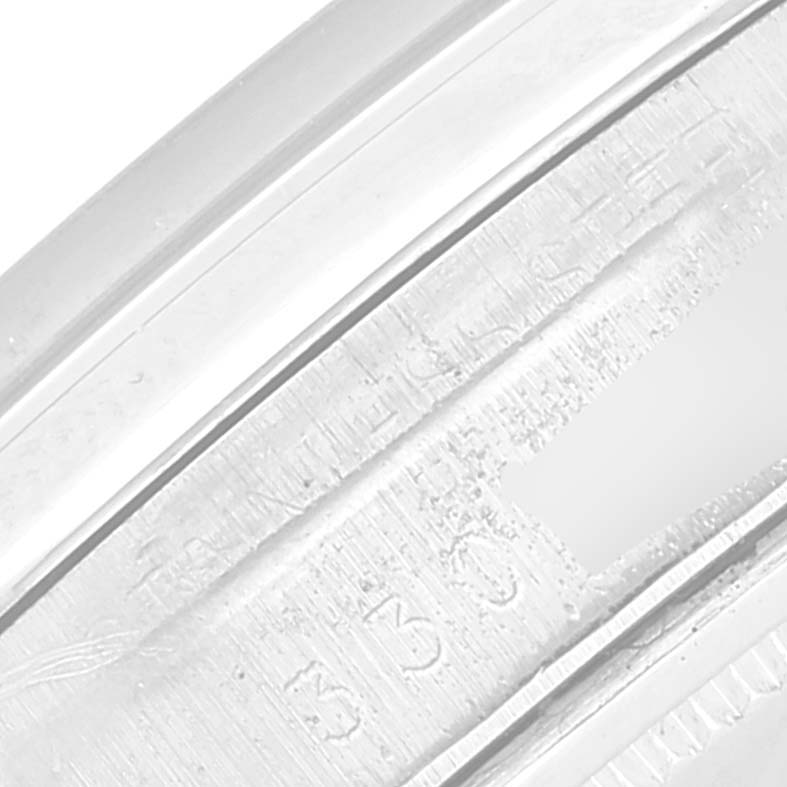 This is a close-up angle of the bezel edge from the Rolex Vintage Collection 6694 Men's Stainless Steel Silver Dial 6694 Men's Stainless Steel Silver Dial watch.