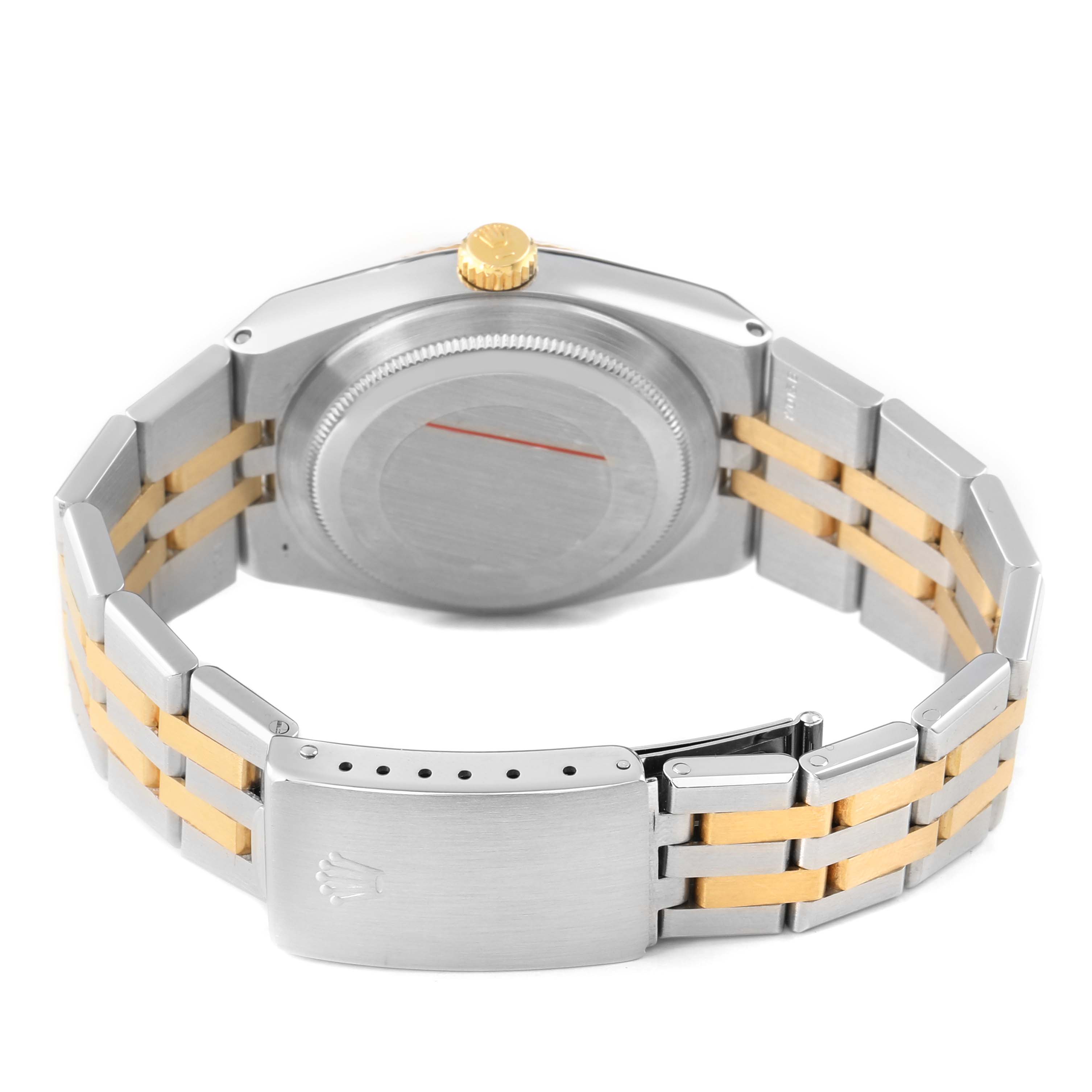 The image shows the back and bracelet of the Rolex Oysterquartz 17013 Men's Steel and Gold (two tone) Champagne Dial, highlighting the clasp, case back, and two-tone links.