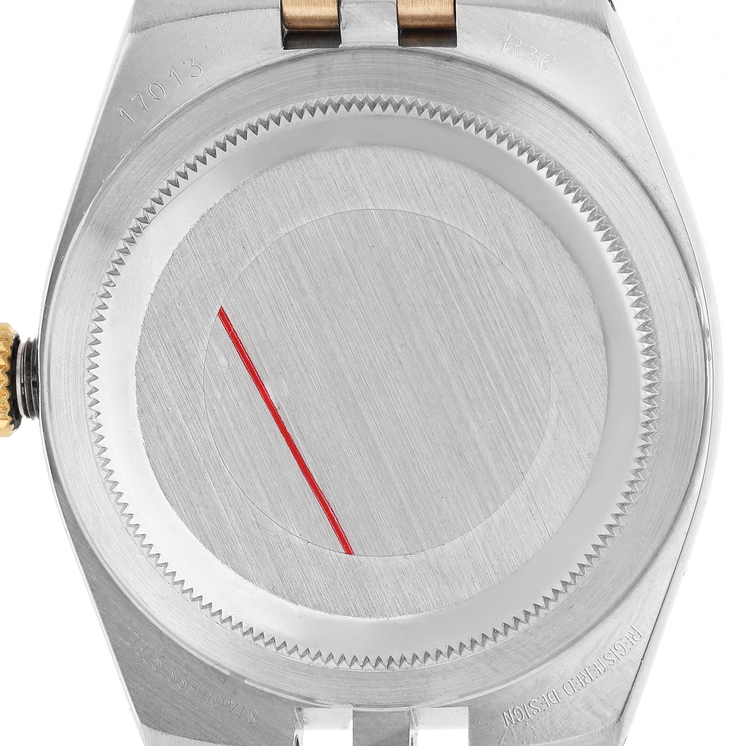 The image shows the case back of a Rolex Oysterquartz 17013 Men's Steel and Gold (two tone) Champagne Dial watch from a rear angle.