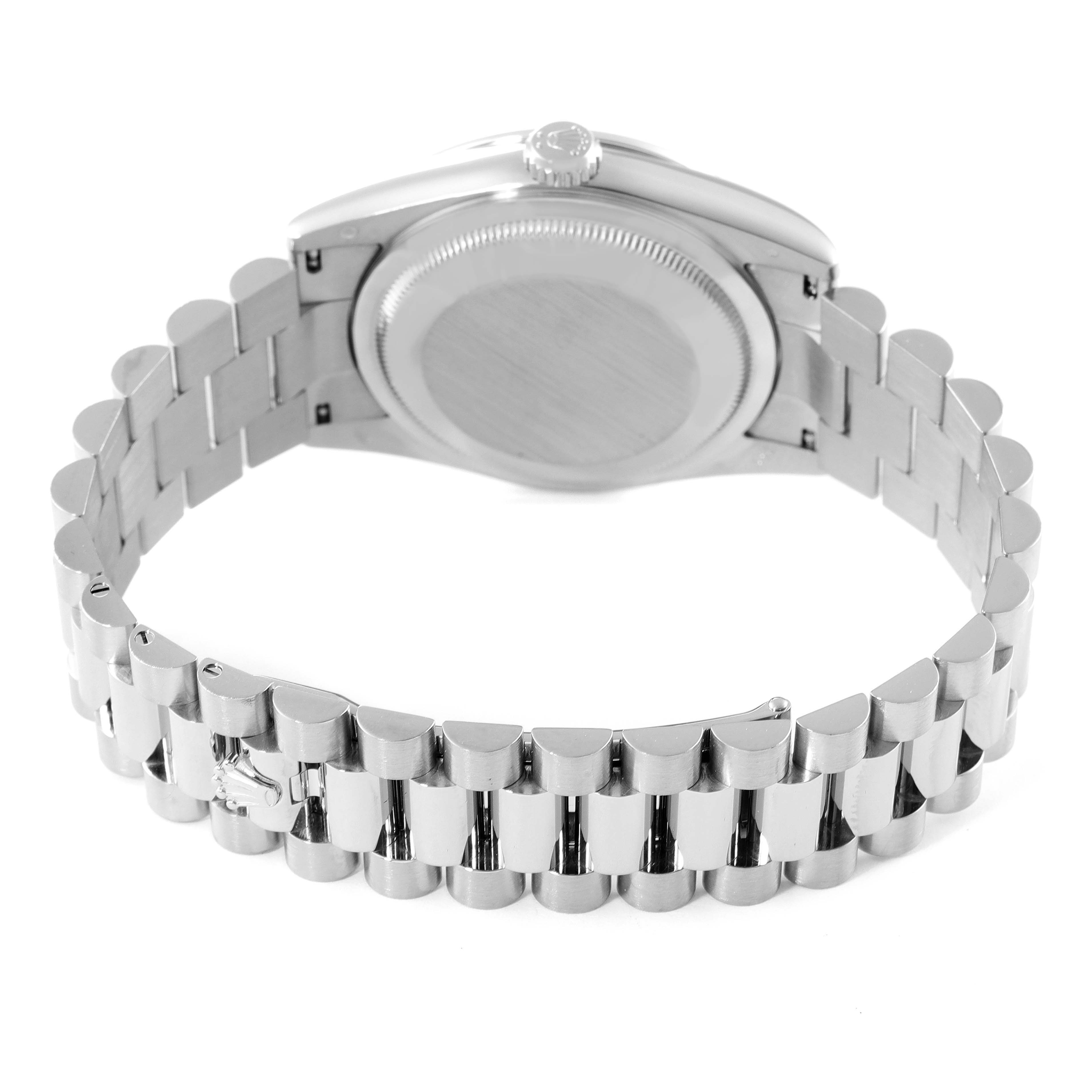 The image shows the back view of a Rolex President 118389 Men's White Gold Silver Dial 118389 Men's White Gold Silver Dial model, highlighting the watch case and bracelet.