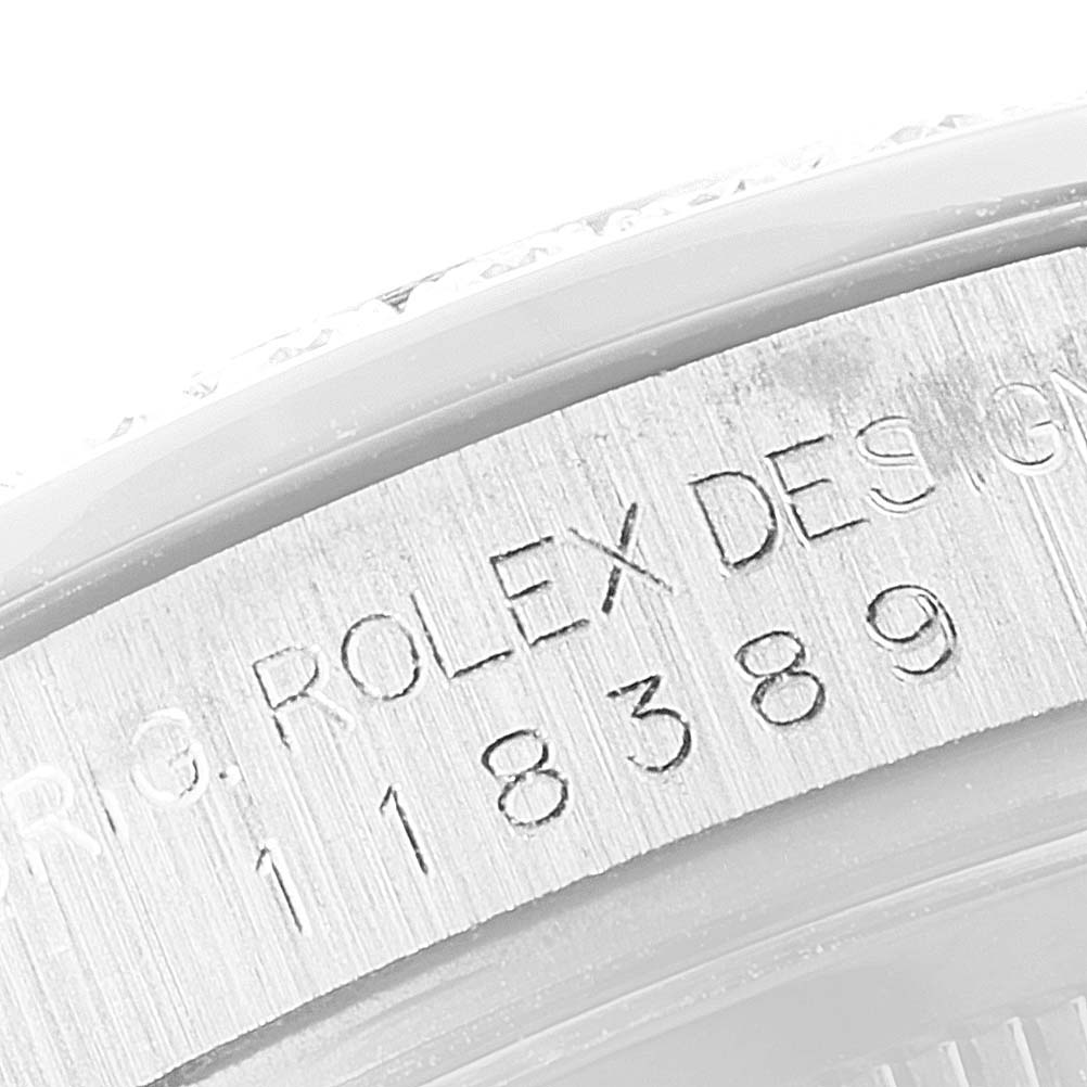 This close-up image shows the engraved model number and branding on the case of a Rolex President 118389 Men's White Gold Silver Dial 118389 Men's White Gold Silver Dial watch.