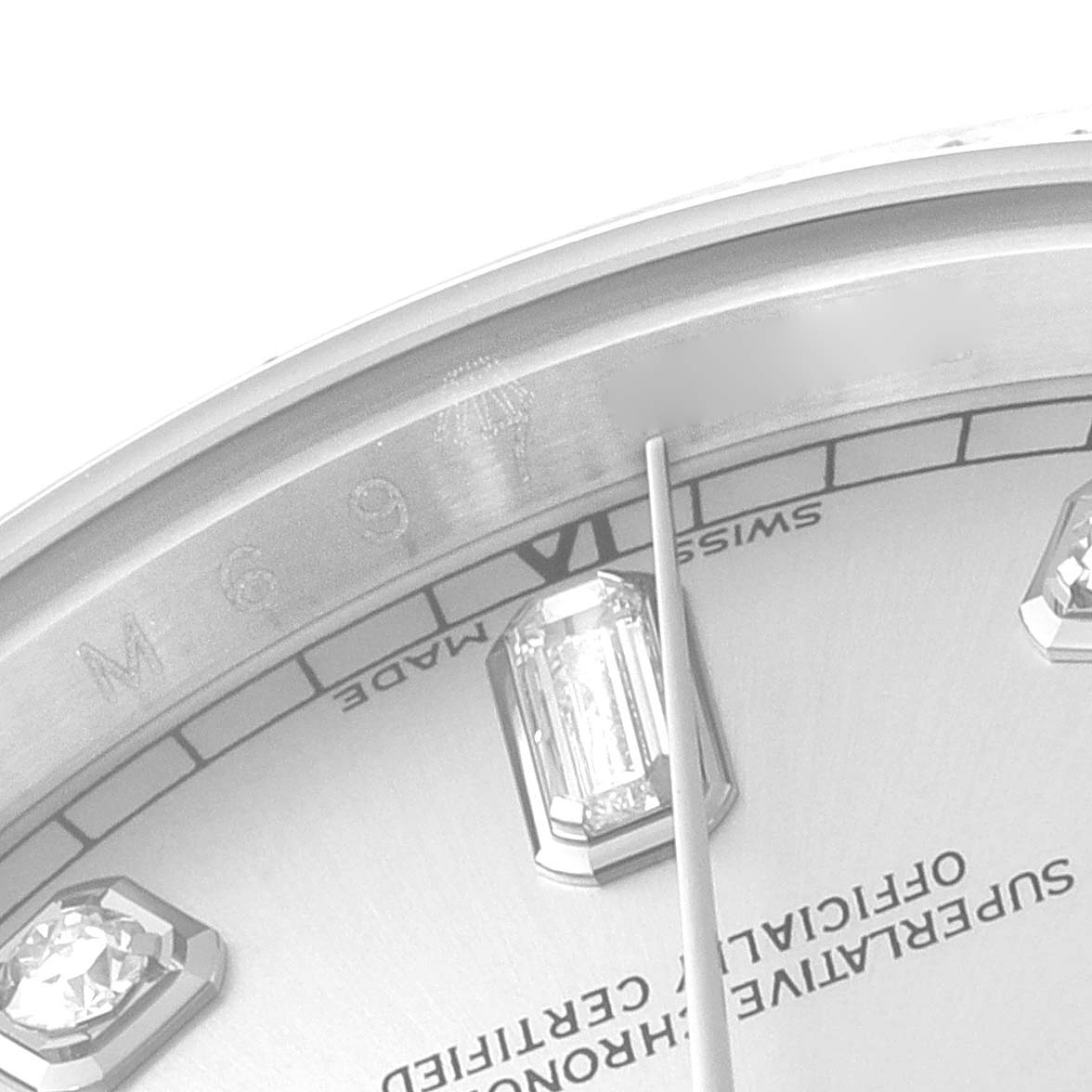 The image shows a close-up of the dial and markers of a Rolex President 118389 Men's White Gold Silver Dial 118389 Men's White Gold Silver Dial model watch.