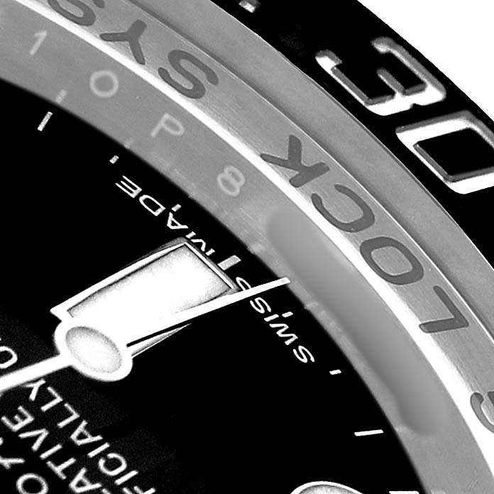 The image shows a close-up of the bezel and part of the dial of a Rolex Sea-Dweller 116660 Men's Stainless Steel Black Dial.