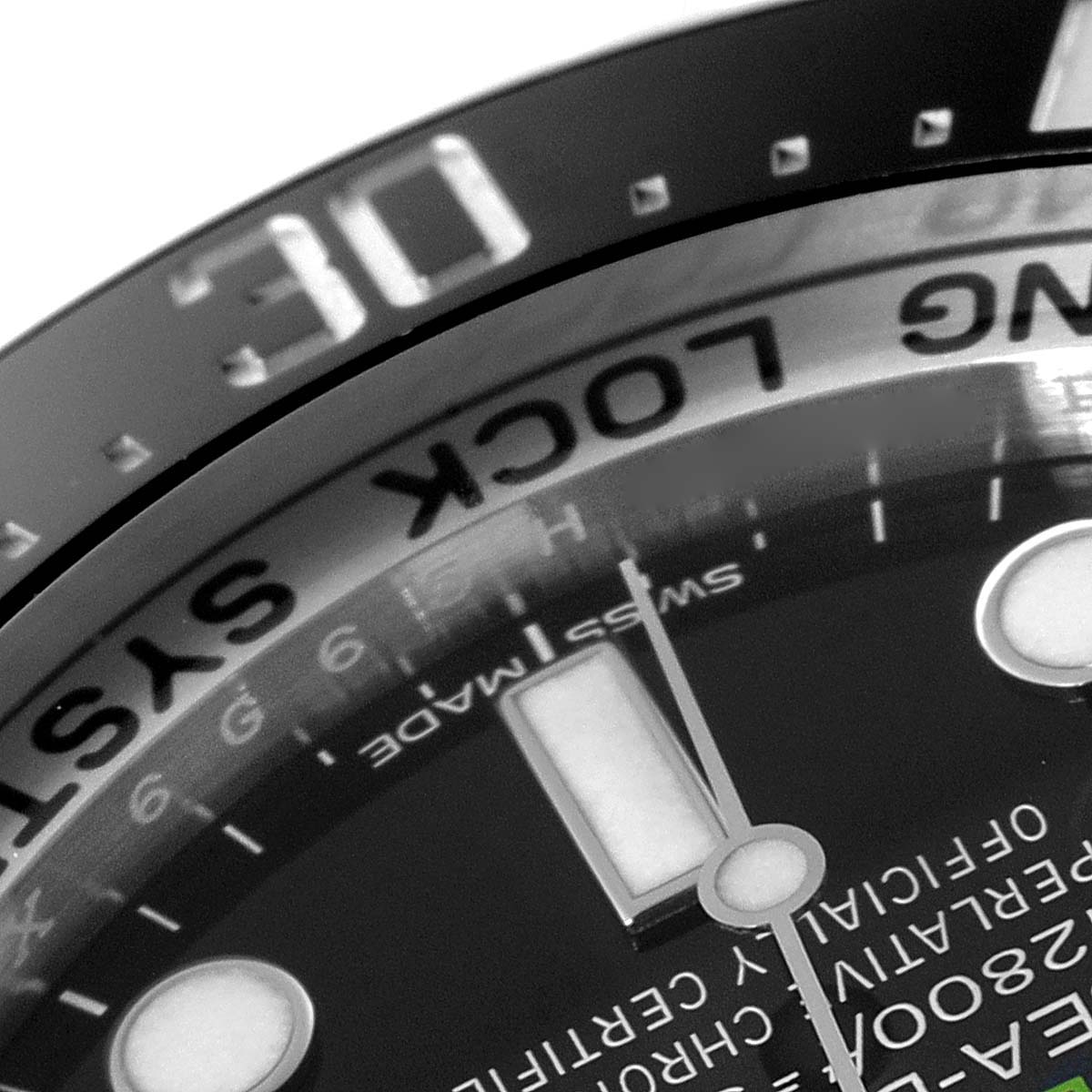 The image shows a close-up of the dial and bezel of a Rolex Sea-Dweller 116660 Men
s Stainless Steel Blue Dial 116660 Men
s Stainless Steel Blue Dial watch, highlighting the markings and text.