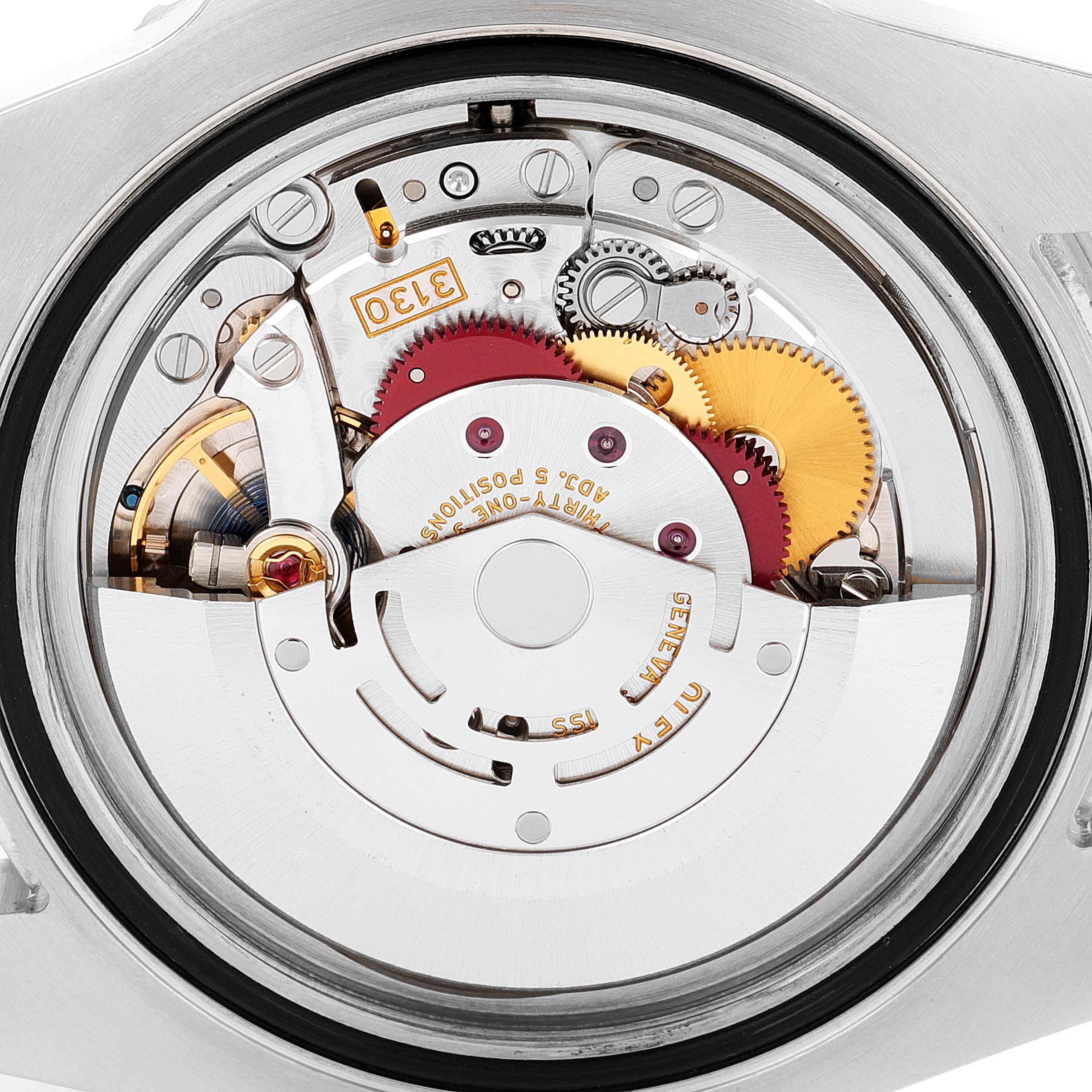 The image shows a close-up view of the internal mechanism of a Rolex Submariner 114060 Men
s Stainless Steel Black Dial 114060 Men
s Stainless Steel Black Dial watch.