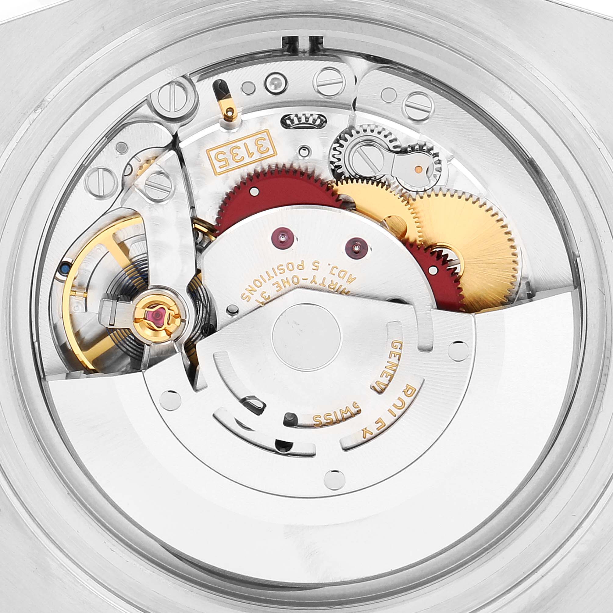 This close-up image captures the interior movement mechanism of the Rolex Submariner 116610LN Men
s Stainless Steel Black Dial 116610LN Men
s Stainless Steel Black Dial watch, showcasing gears and intricate components.