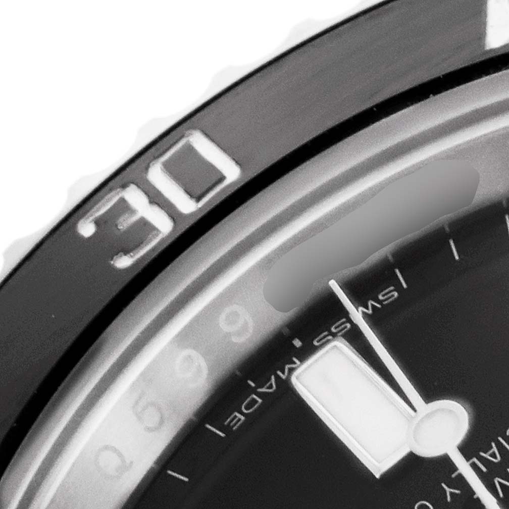This close-up image shows the bezel and part of the dial of a Rolex Submariner 116610LN Men's Stainless Steel Black Dial 116610LN Men's Stainless Steel Black Dial watch.