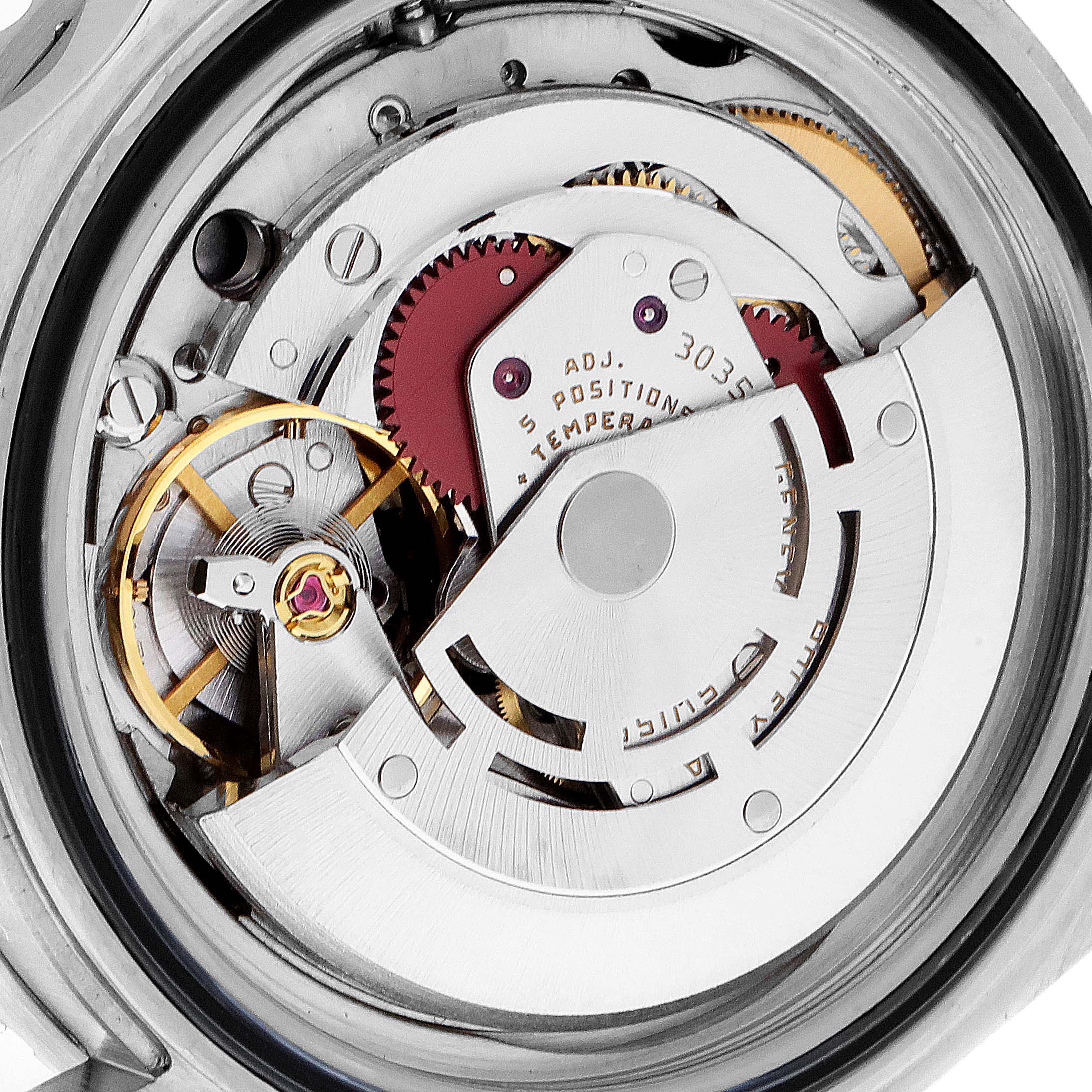 This image shows the intricate internal movement mechanics of a Rolex Submariner 168000 Men's Stainless Steel Black Dial 168000 Men's Stainless Steel Black Dial watch from a close-up angle.