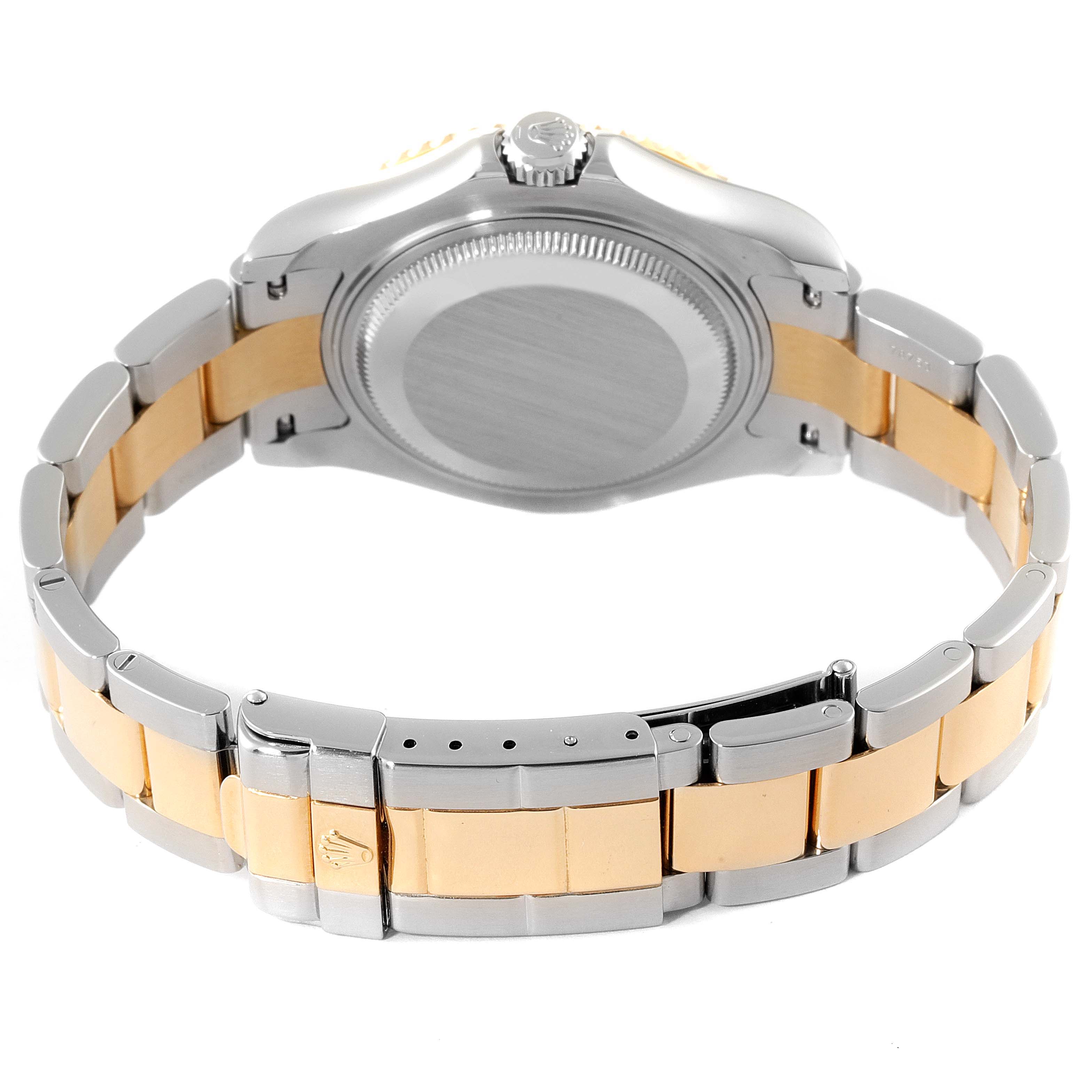 This image shows the backside of the Rolex Yacht-Master 68623 Men
s Steel and Gold (two tone) White Dial 68623 Men
s Steel and Gold (two tone) White Dial watch, highlighting the case and two-tone bracelet with a clasp.