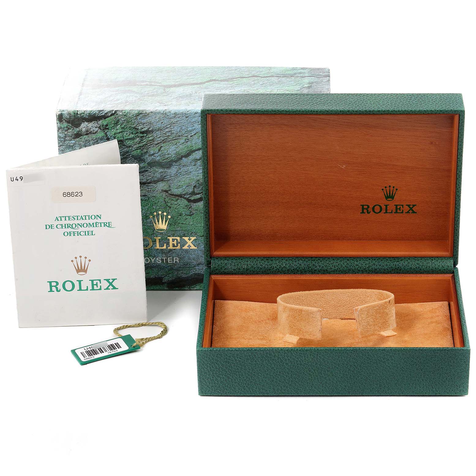 The image shows an open Rolex watch box for the Yacht-Master model, along with paperwork and a tag.
