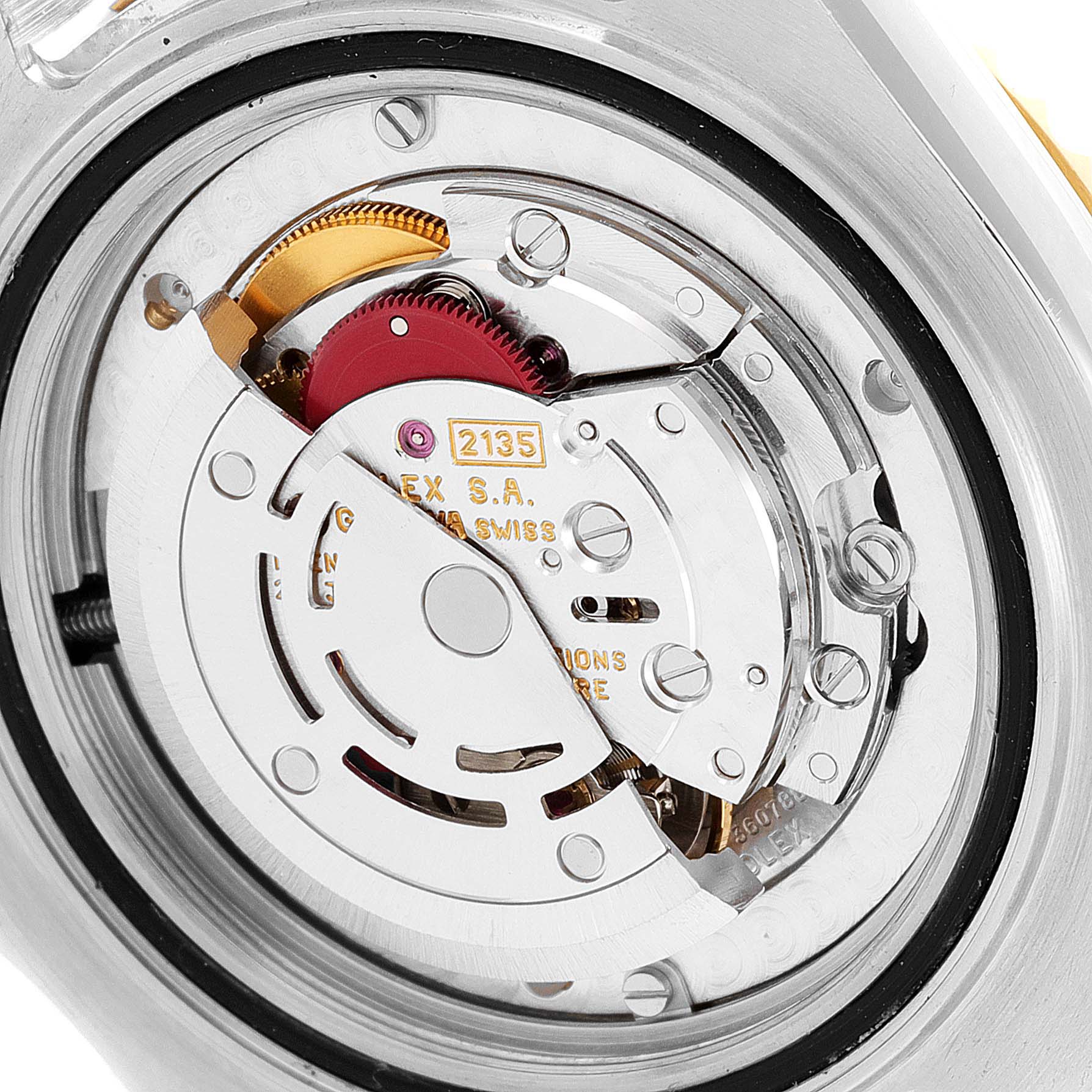 This is a close-up view of the Rolex Yacht-Master 68623 Men
s Steel and Gold (two tone) White Dial 68623 Men
s Steel and Gold (two tone) White Dial
s internal movement mechanism, displaying gears and intricate components.