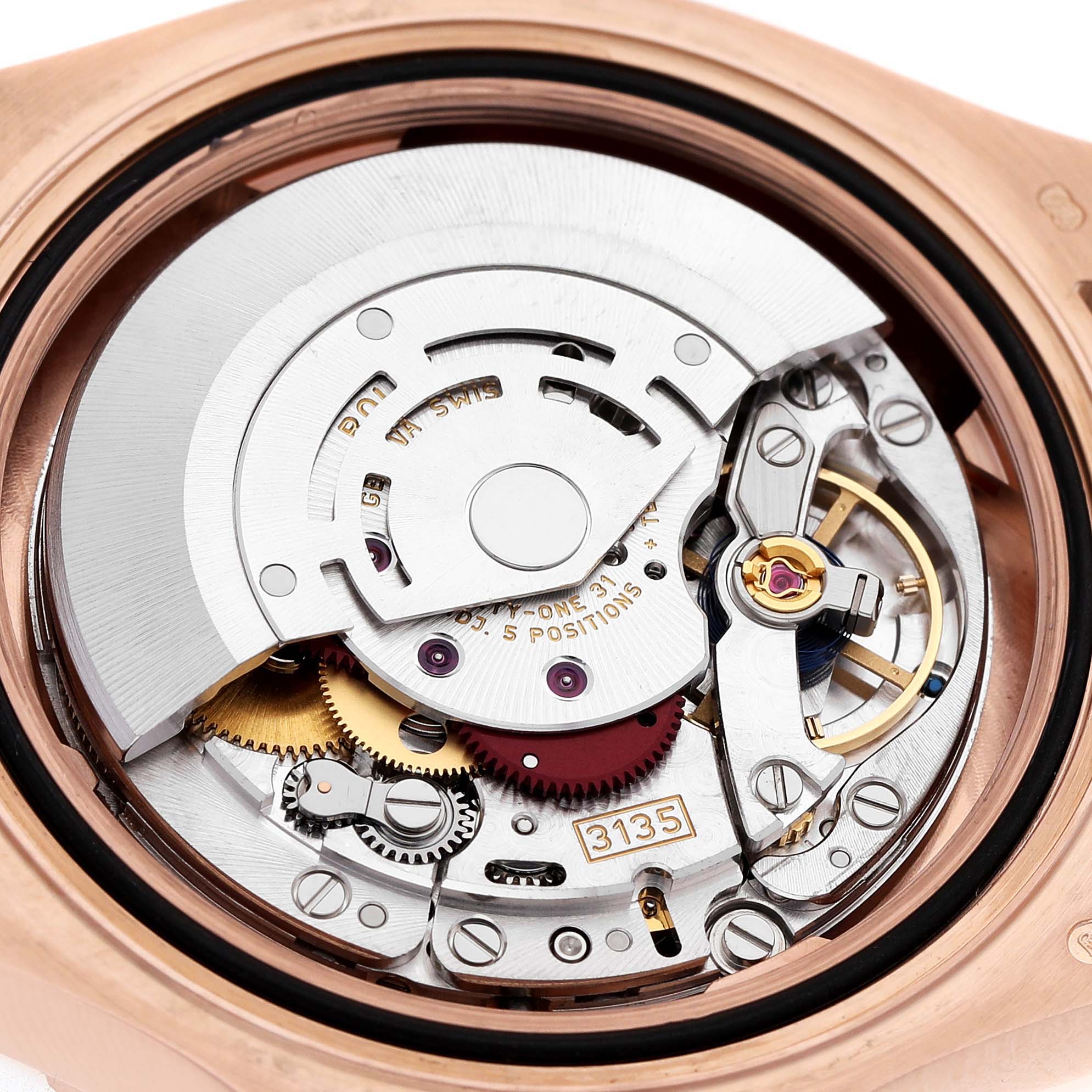 The image shows the intricate movement and mechanism of a Rolex Yacht-Master 116655 Men's Rose Gold Black Dial watch from the back.