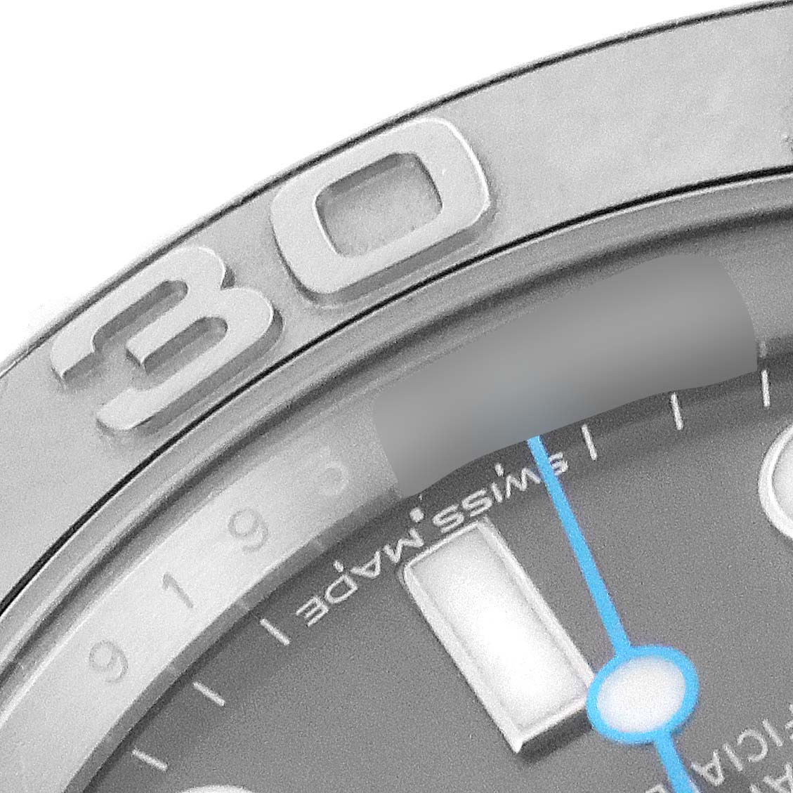 This is a close-up of the bezel, hour markers, and part of the dial of a Rolex Yacht-Master 116622 Men
s Stainless Steel Grey Dial 116622 Men
s Stainless Steel Grey Dial watch.
