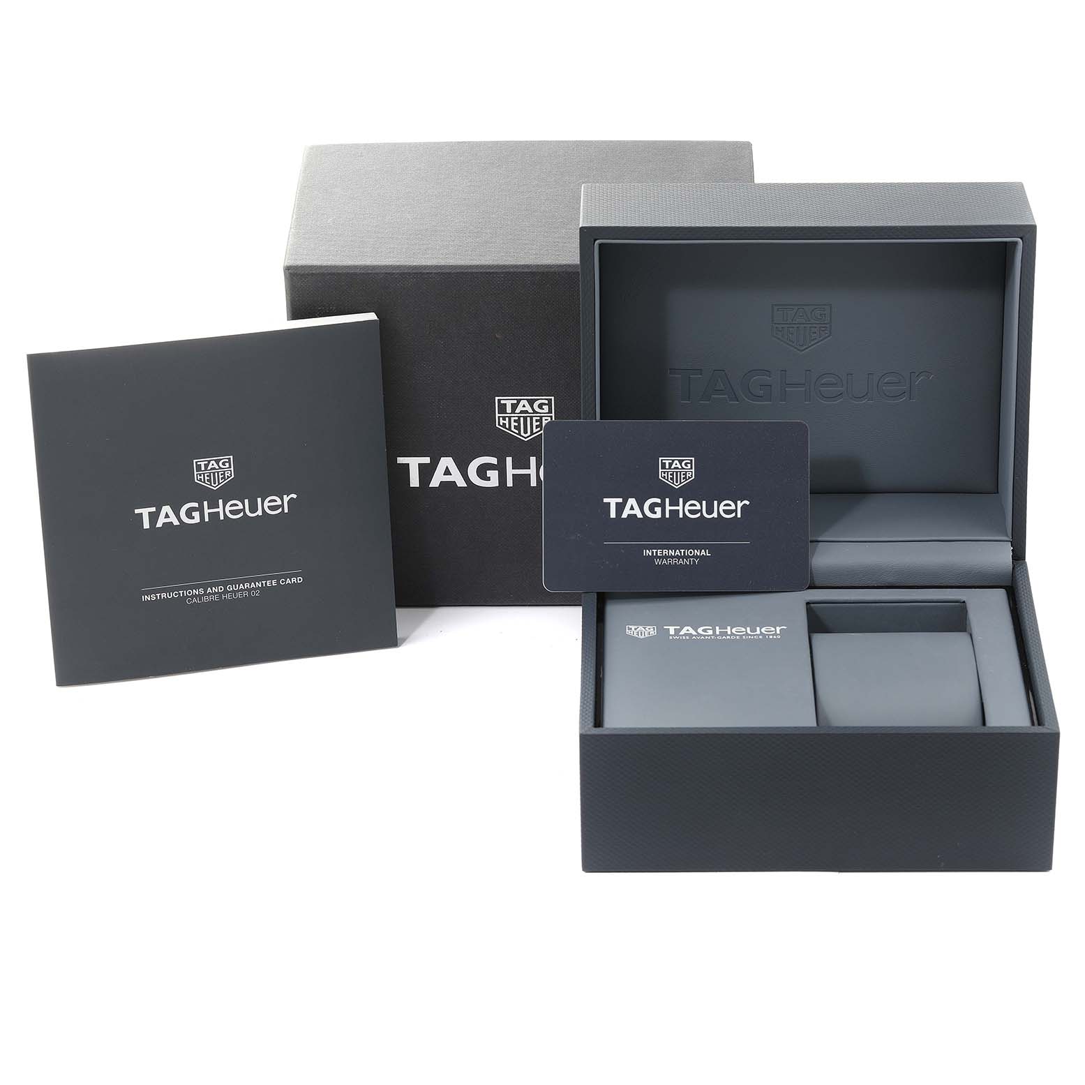 The image shows the packaging, warranty card, and instruction booklet for the Tag Heuer Limited Edition CBG2019.BA0662 Men's Stainless Steel Blue Dial CBG2019.BA0662 Men's Stainless Steel Blue Dial watch.