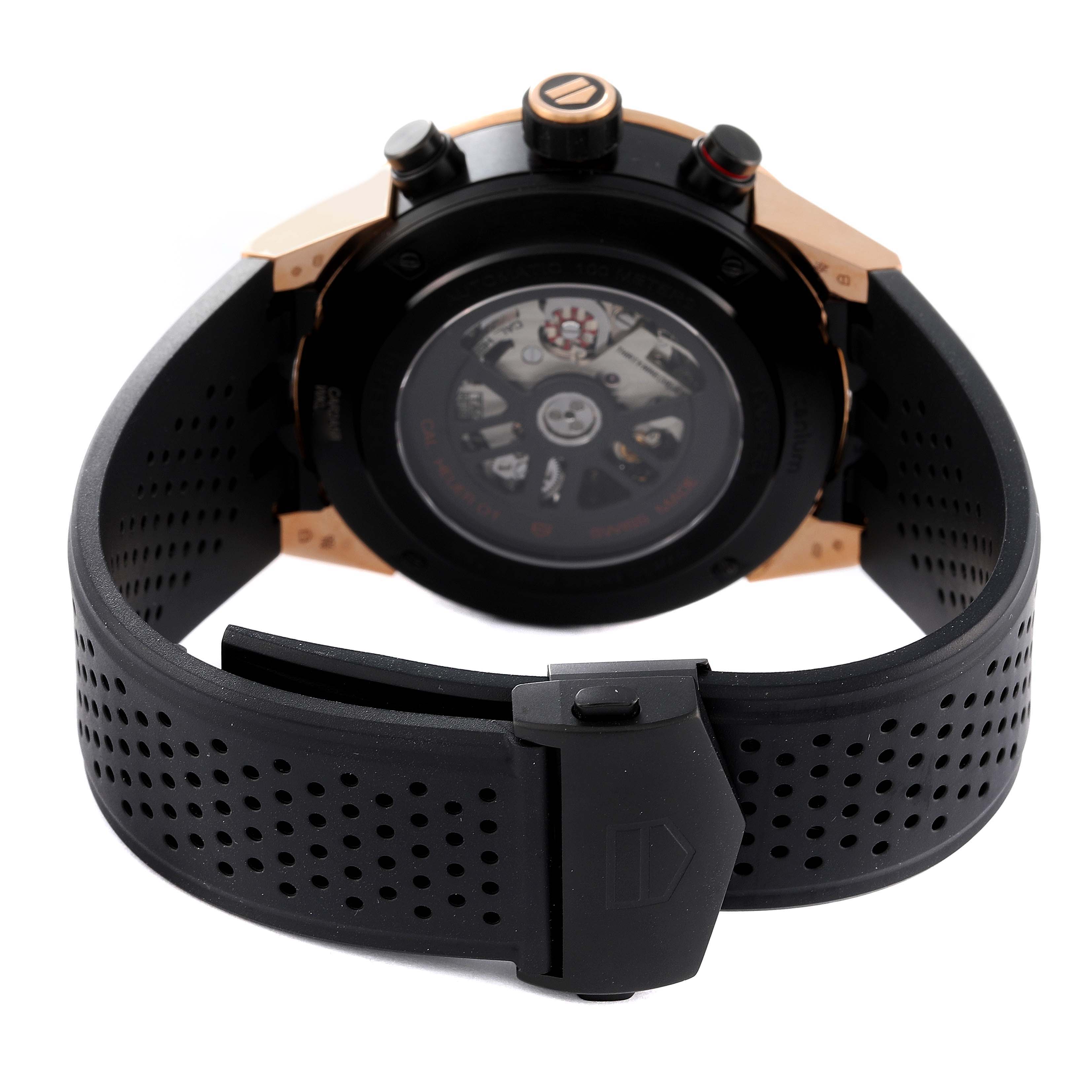 This Tag Heuer Carrera CAR2A5B.FT6044 Men's Steel and Gold (two tone) Black Dial CAR2A5B.FT6044 Men's Steel and Gold (two tone) Black Dial model watch is shown from the back, highlighting the black strap, clasp, and internal mechanics.