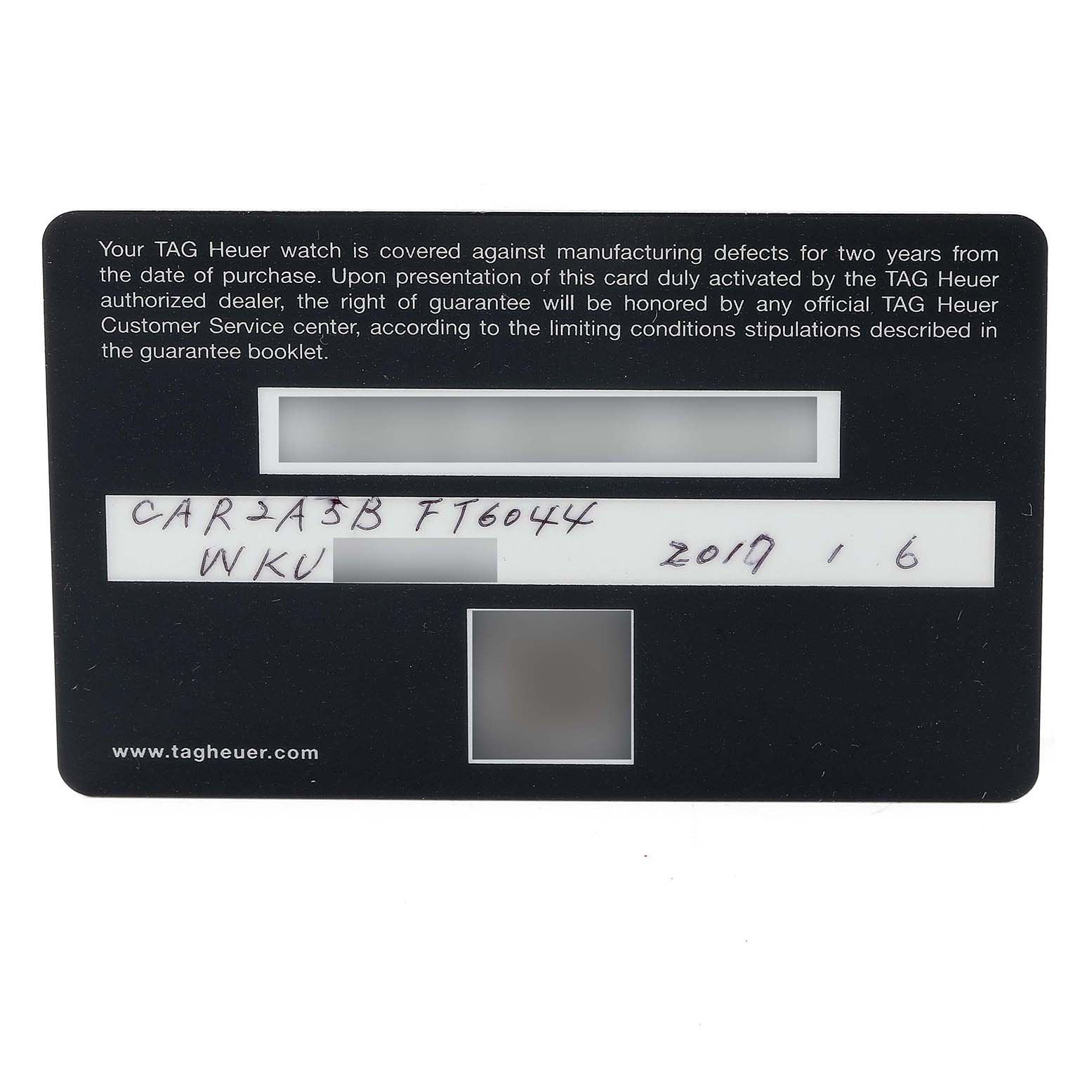 This image shows a warranty card for the Carrera model by Tag Heuer placed flat, displaying handwritten and printed information.