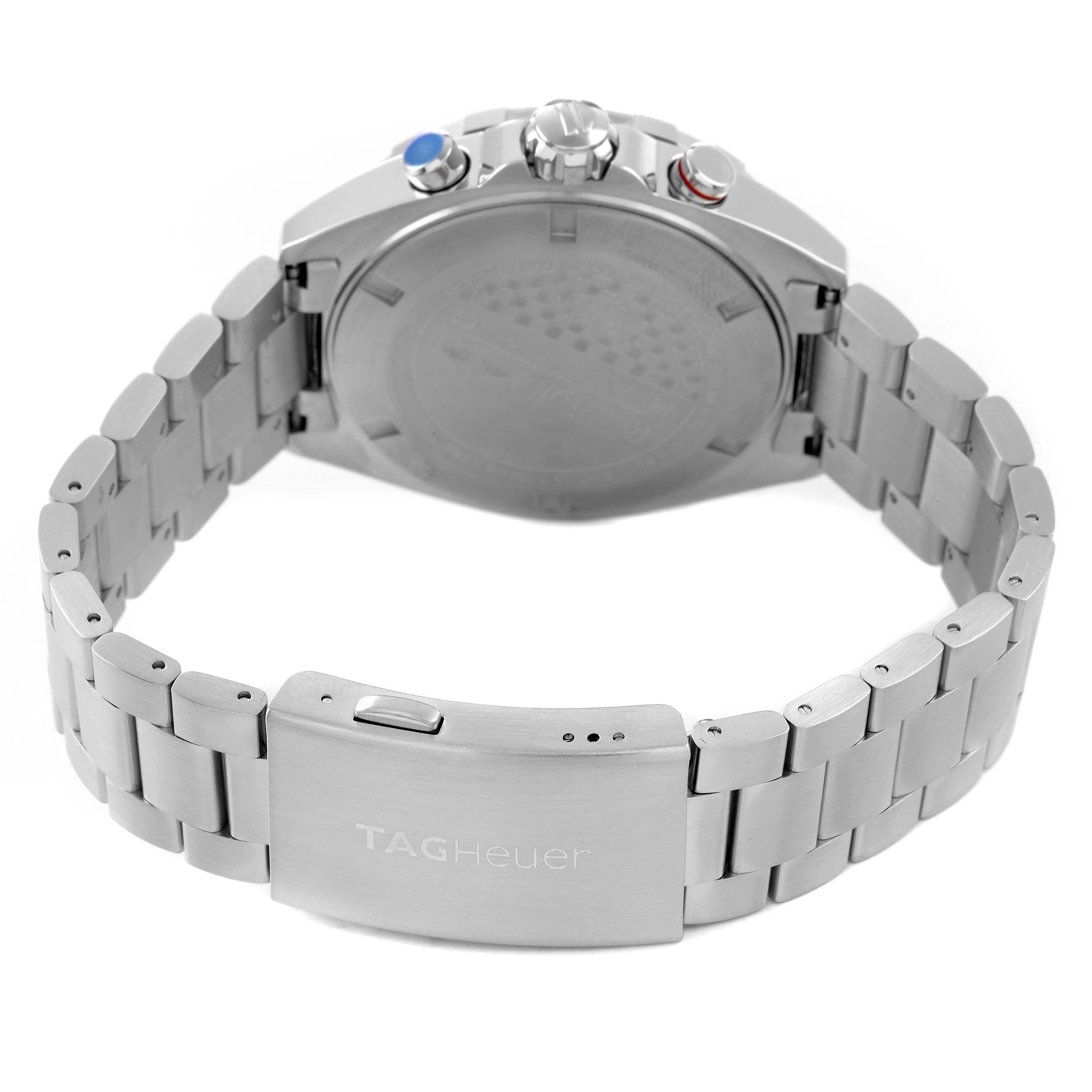 The image shows a Tag Heuer Formula 1 CAZ101AL.BA0842 Men's Stainless Steel Blue Dial watch from the back, displaying the case, crown, pushers, and bracelet clasp.