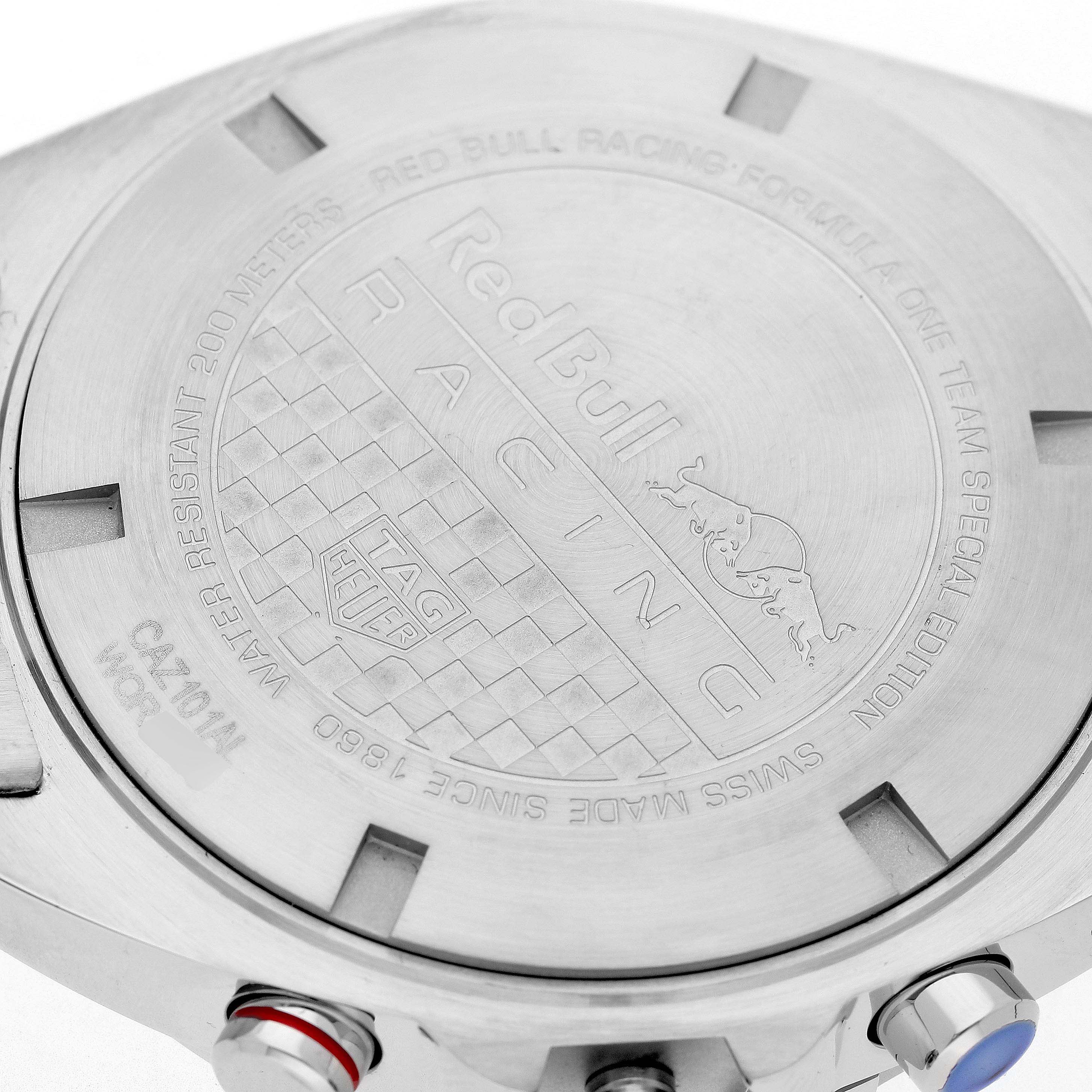 The image shows the back case of the Tag Heuer Formula 1 CAZ101AL.BA0842 Men's Stainless Steel Blue Dial watch, featuring "Red Bull Racing" engraving.