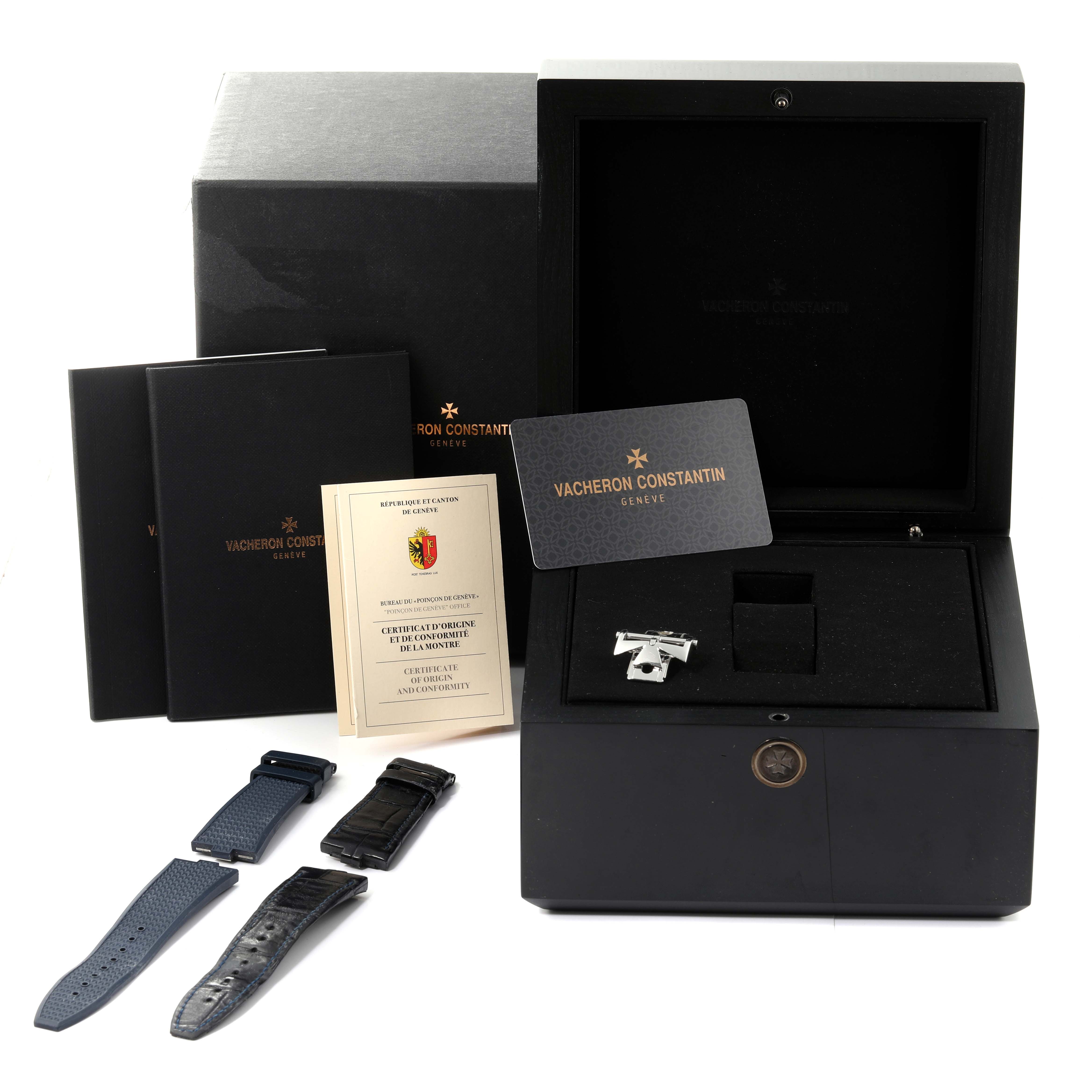 The image shows a Vacheron Constantin Overseas 5500V/110A-B148 Men's Stainless Steel Blue Dial 5500V/110A-B148 Men's Stainless Steel Blue Dial watch box, warranty card, certificates, and straps from a frontal angle.