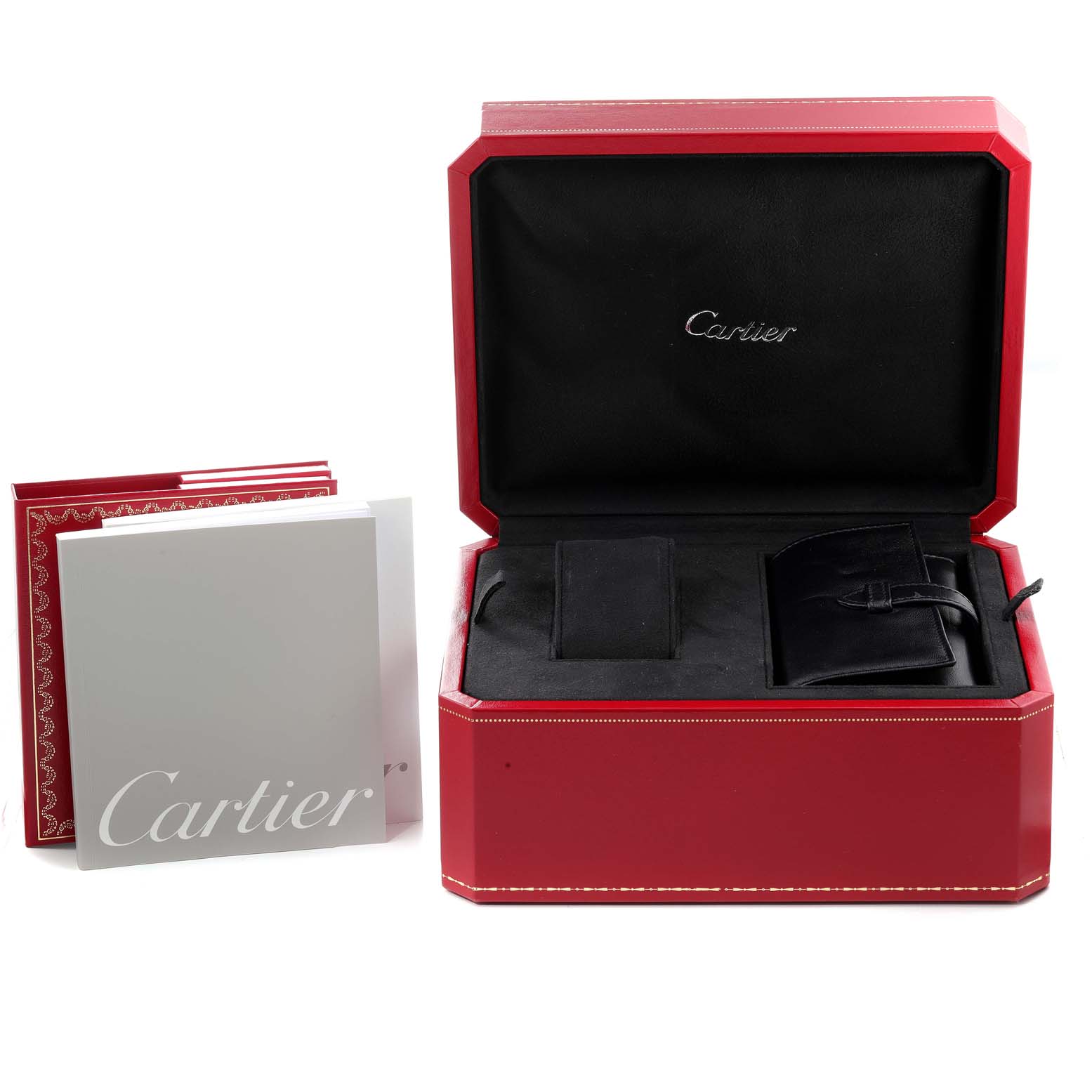 The image shows a Cartier Roadster W62020X6 Men
s Stainless Steel Black Dial W62020X6 Men
s Stainless Steel Black Dial watch box, open to display the interior, with accompanying booklets placed beside it.