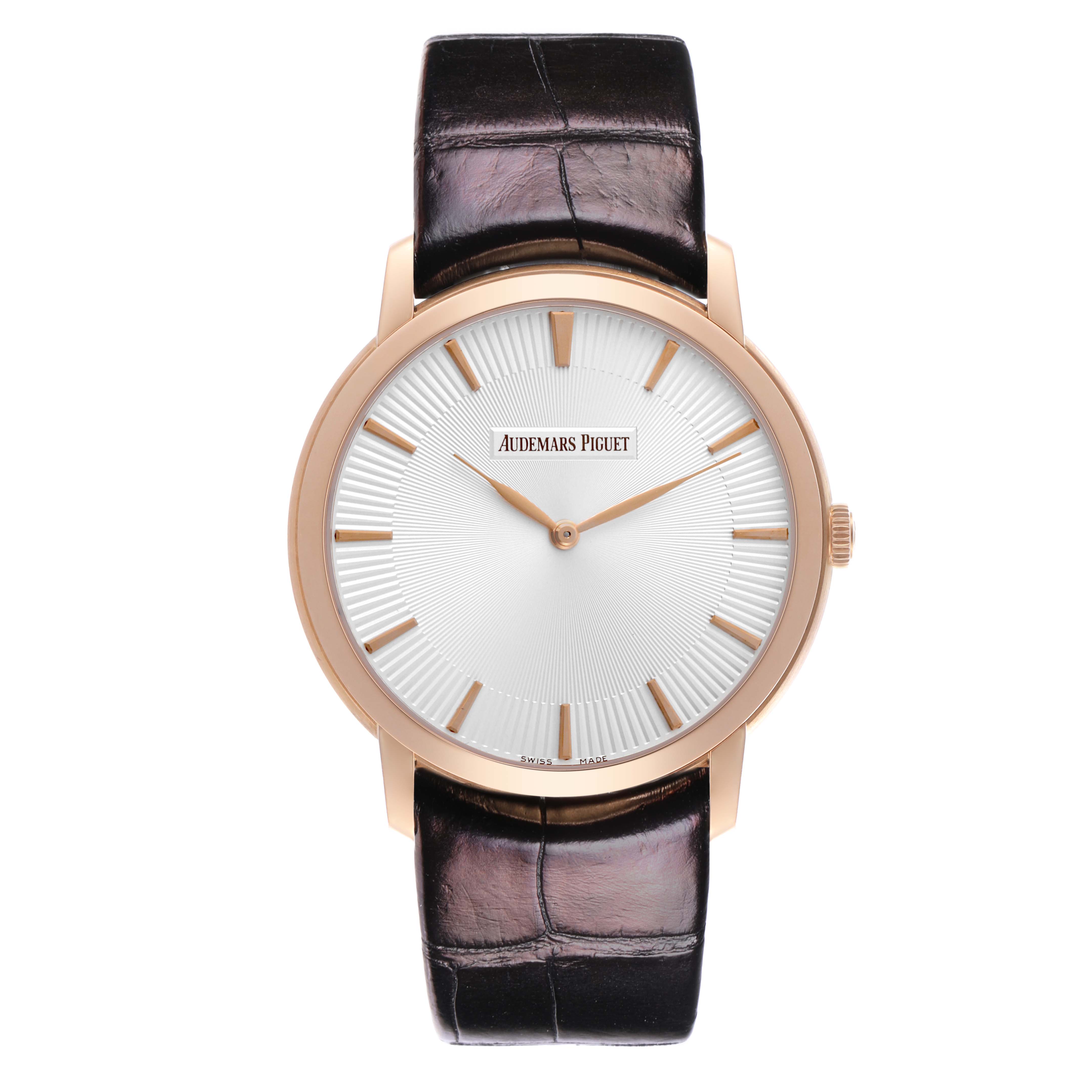 The Audemars Piguet Jules 15180OR.OO.A102CR.01 Men's Rose Gold Silver Dial 15180OR.OO.A102CR.01 Men's Rose Gold Silver Dial watch is shown from a top-down angle, displaying the dial, hands, and leather strap.