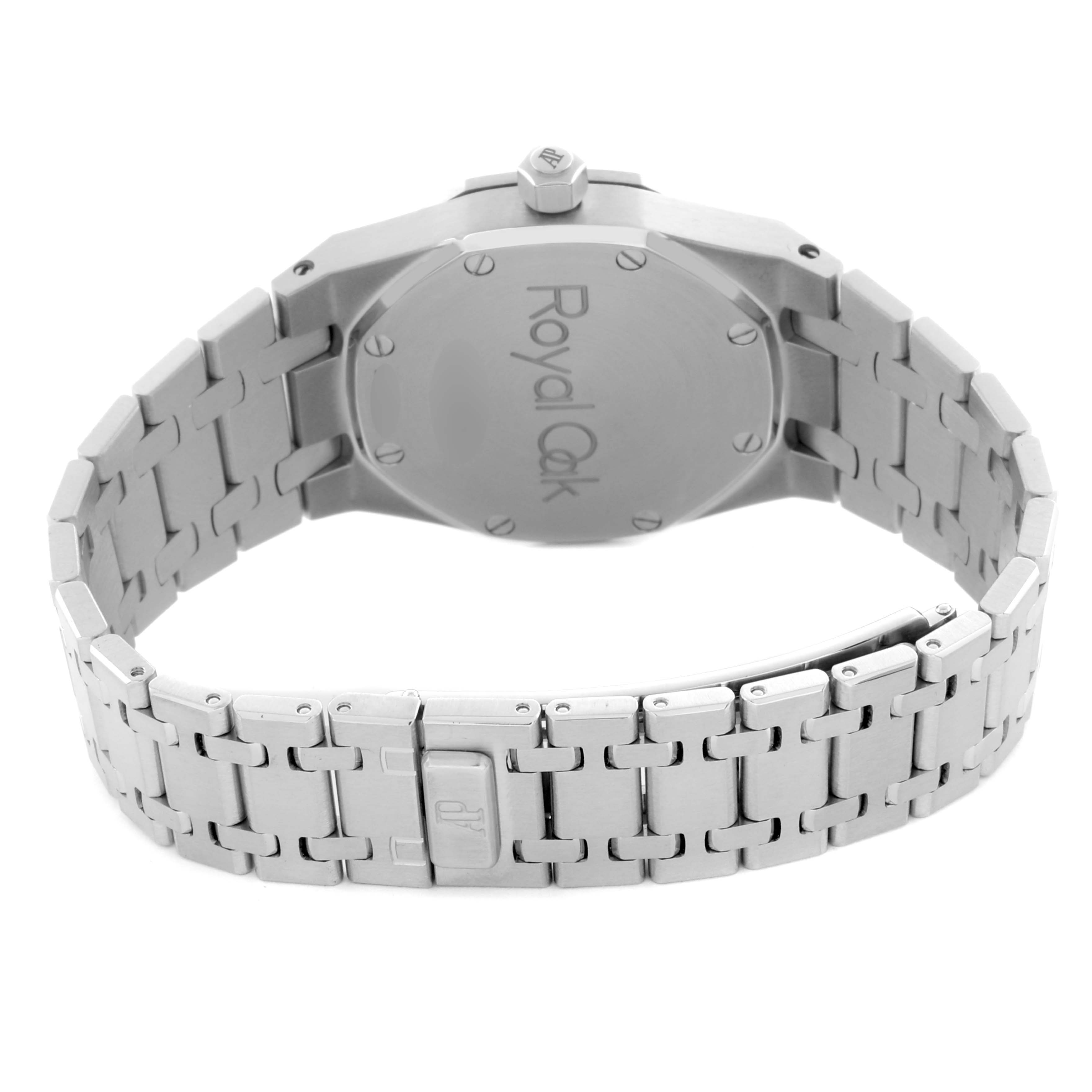 The image shows the back and bracelet of a Royal Oak by Audemars Piguet, focusing on the clasp and case back.