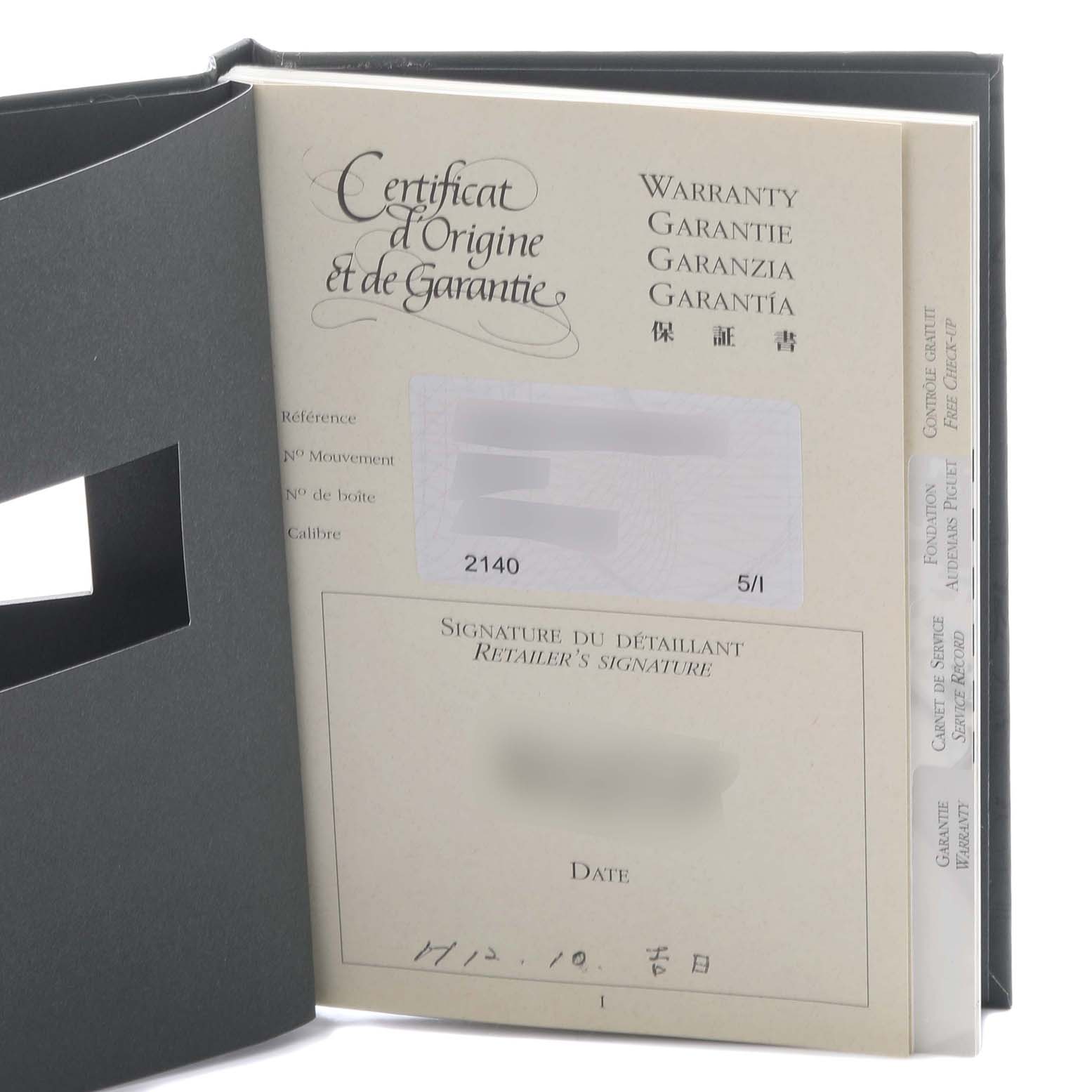 The image shows a warranty booklet and certificate for the Audemars Piguet Royal Oak 15000ST.OO.0789ST.06 Men's Stainless Steel Blue Dial 15000ST.OO.0789ST.06 Men's Stainless Steel Blue Dial, viewed slightly open from the side.