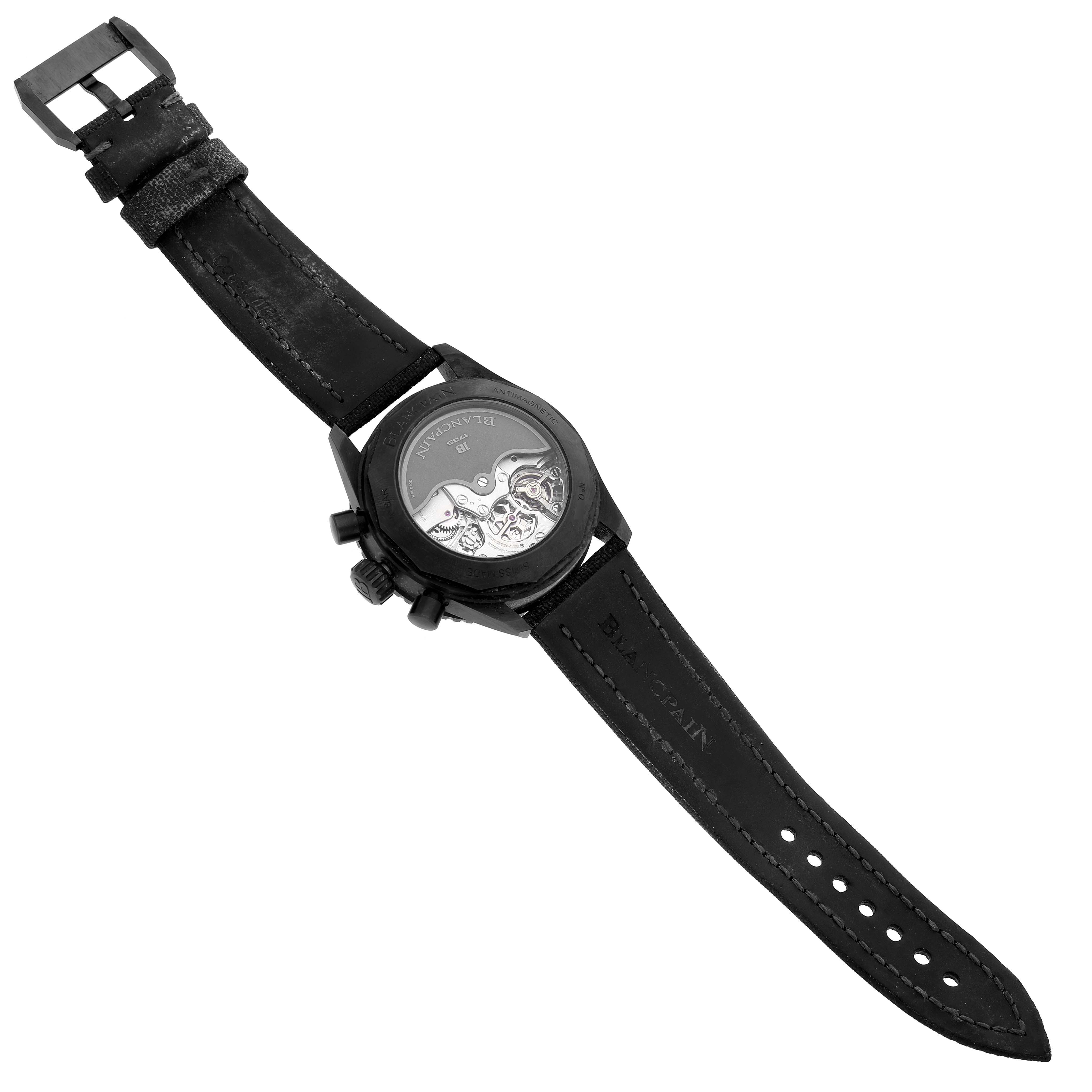 The image shows the back view of a Blancpain Fifty Fathoms 5200-0730-852A Men's Ceramic Black Dial watch, highlighting the movement and strap.