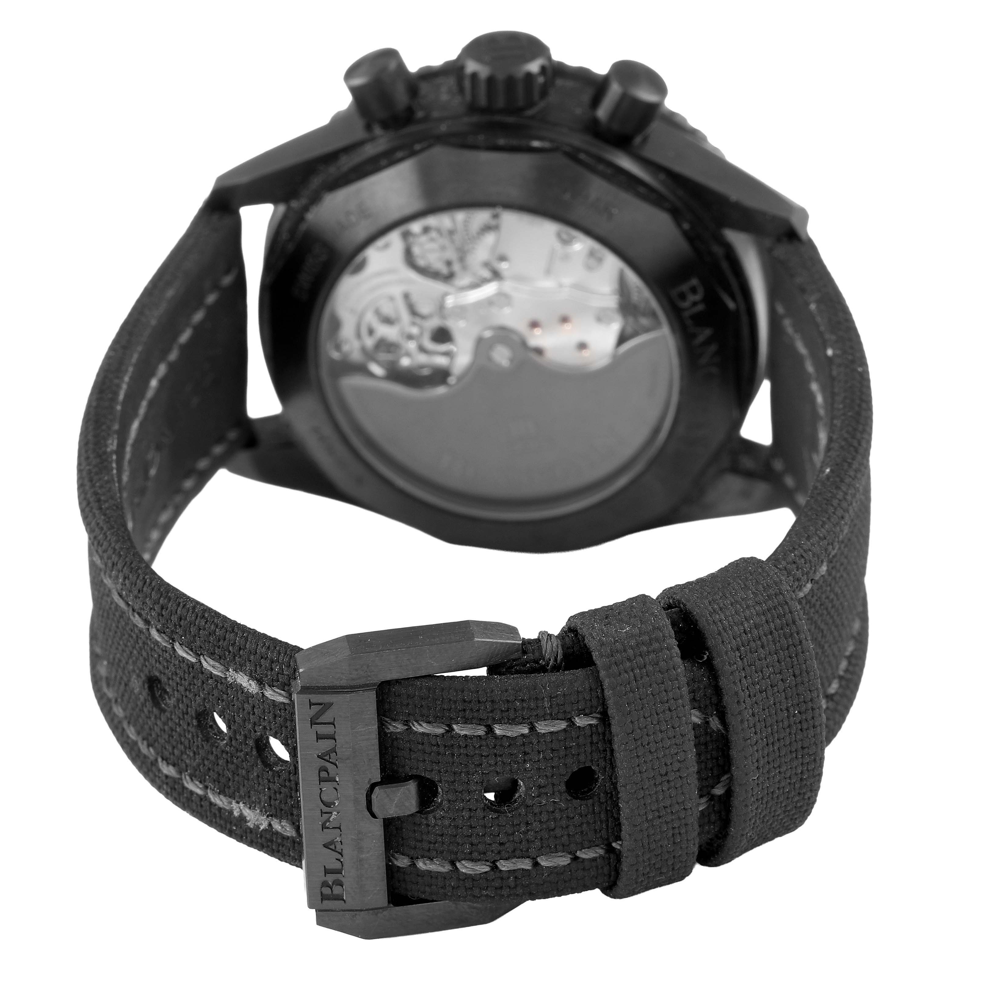 The Blancpain Fifty Fathoms 5200-0730-852A Men's Ceramic Black Dial watch is shown from the back, highlighting the case back and part of the strap with clasp.