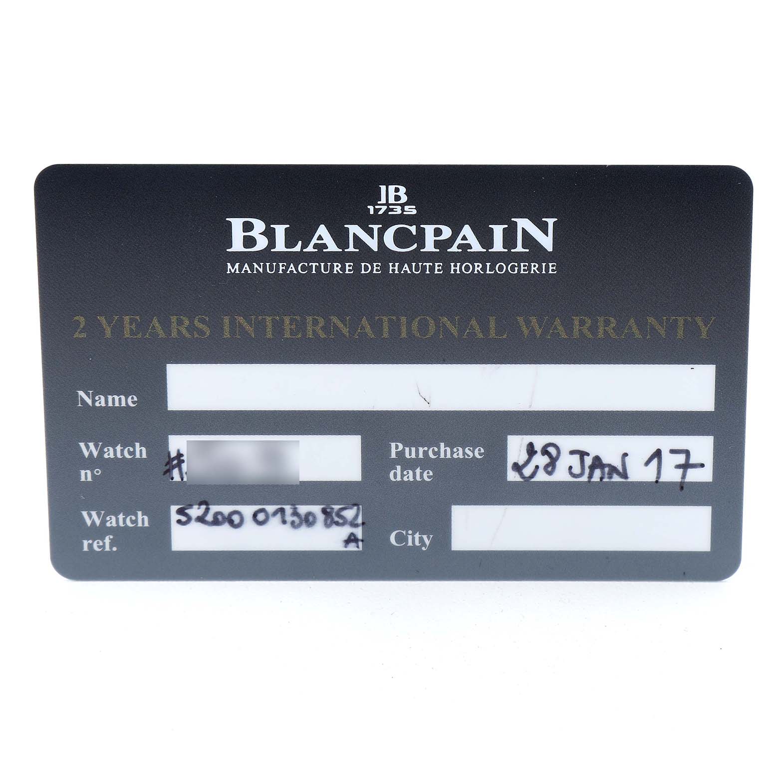The image shows a warranty card for a Blancpain Fifty Fathoms 5200-0730-852A Men's Ceramic Black Dial watch from a front angle.