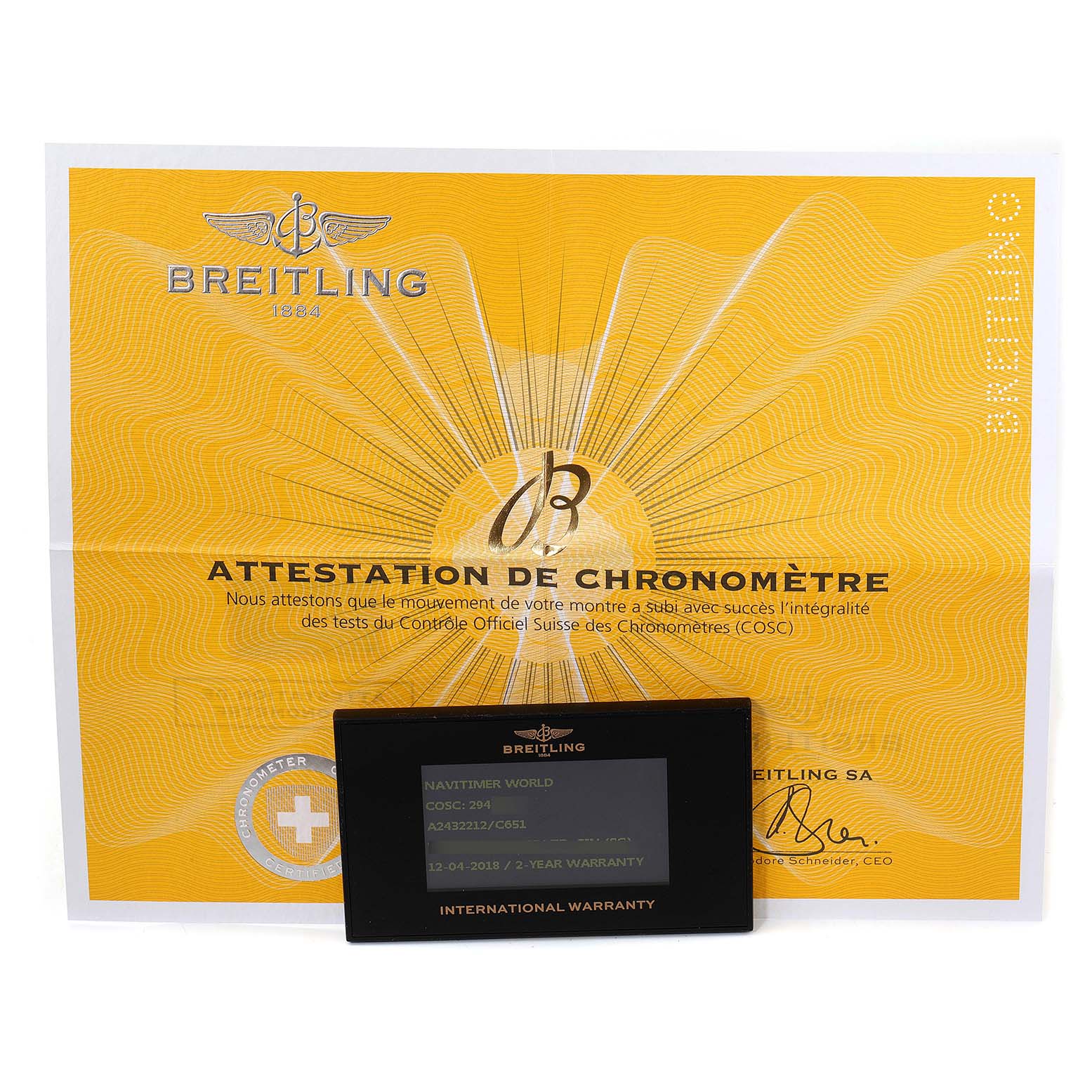 The image shows the warranty card and chronometer certificate for the Breitling Navitimer A24322 Men's Stainless Steel Blue Dial A24322 Men's Stainless Steel Blue Dial model.