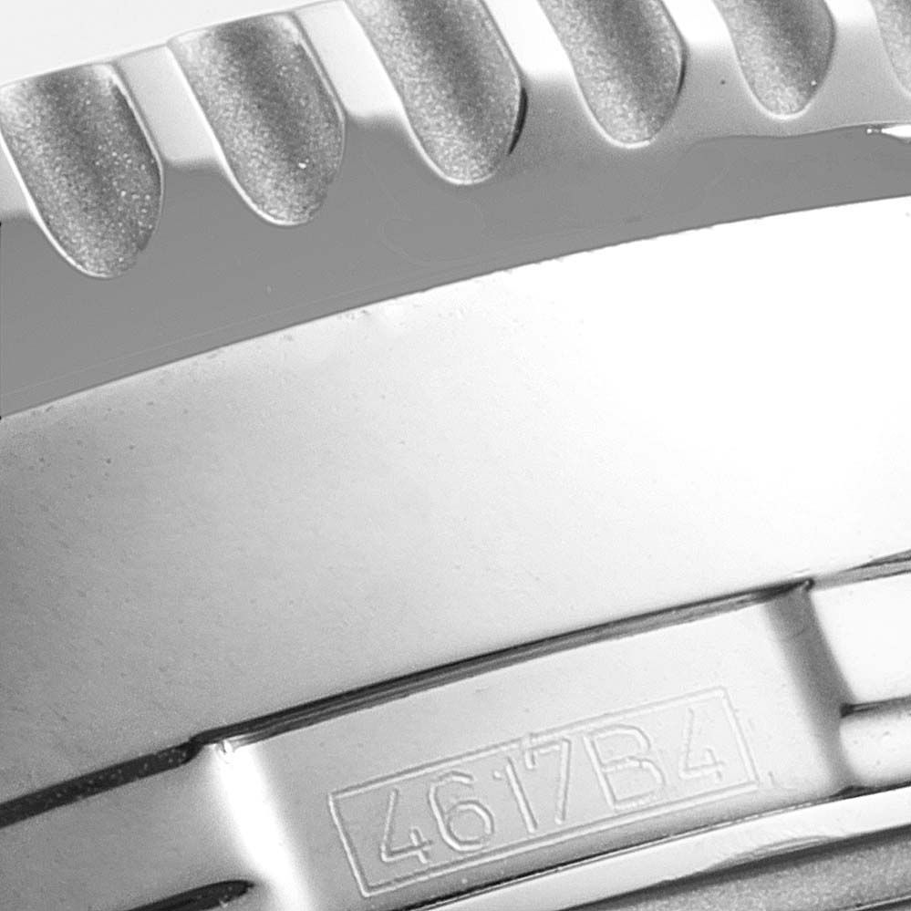 The image shows a close-up of the bezel and case side, displaying part of the serial number on the Breitling Navitimer A24322 Men's Stainless Steel Blue Dial A24322 Men's Stainless Steel Blue Dial watch.