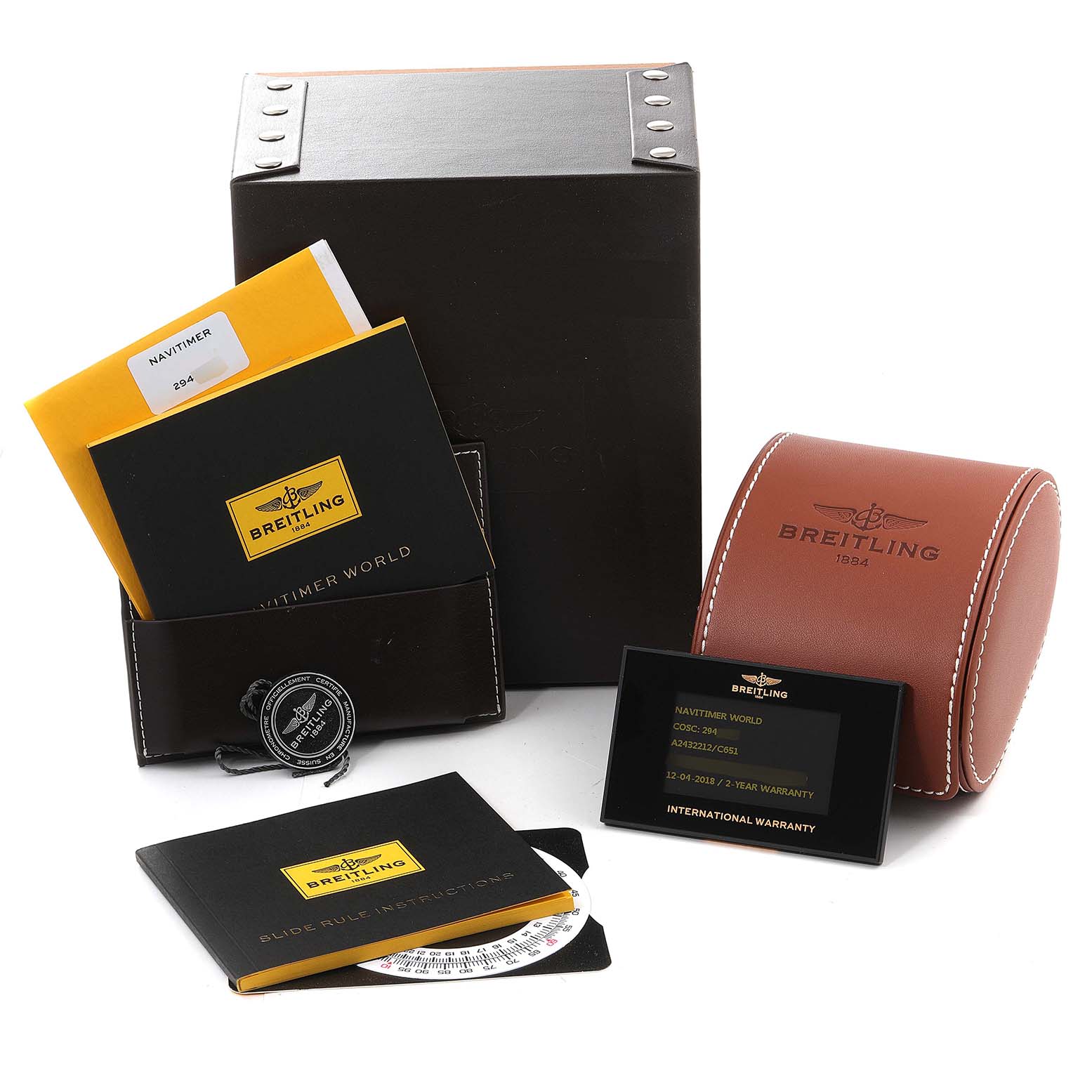 The image shows the packaging and accessories for a Breitling Navitimer A24322 Men's Stainless Steel Blue Dial A24322 Men's Stainless Steel Blue Dial watch, including boxes, booklets, and an international warranty card.