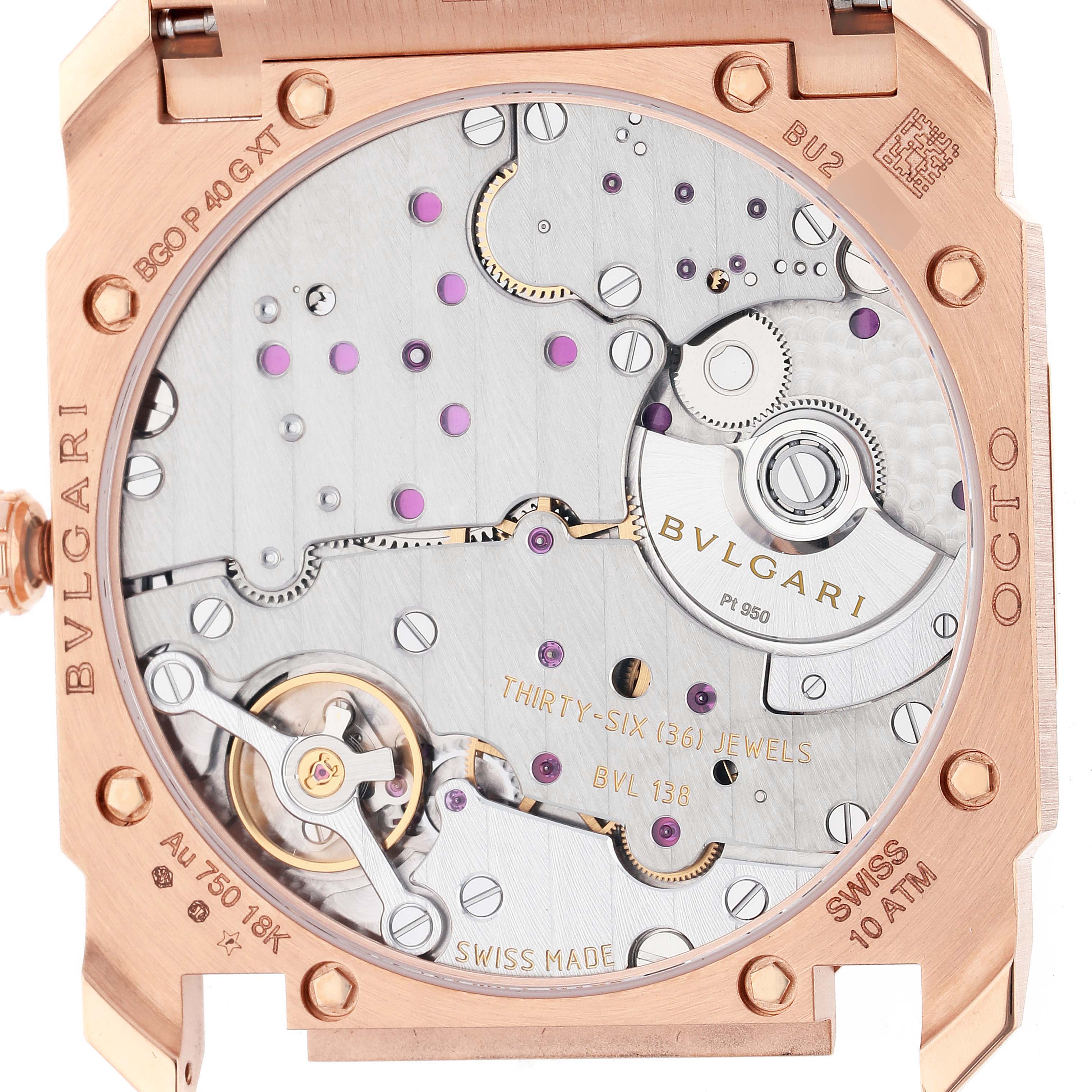 This is a close-up view of the back casing and internal mechanisms of the Bvlgari Octo 103637 Men's Rose Gold Brown Dial 103637 Men's Rose Gold Brown Dial watch.