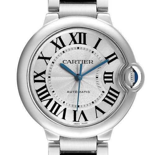 The Ballon Bleu by Cartier is shown from a front angle, highlighting the dial, Roman numerals, and sapphire crown.