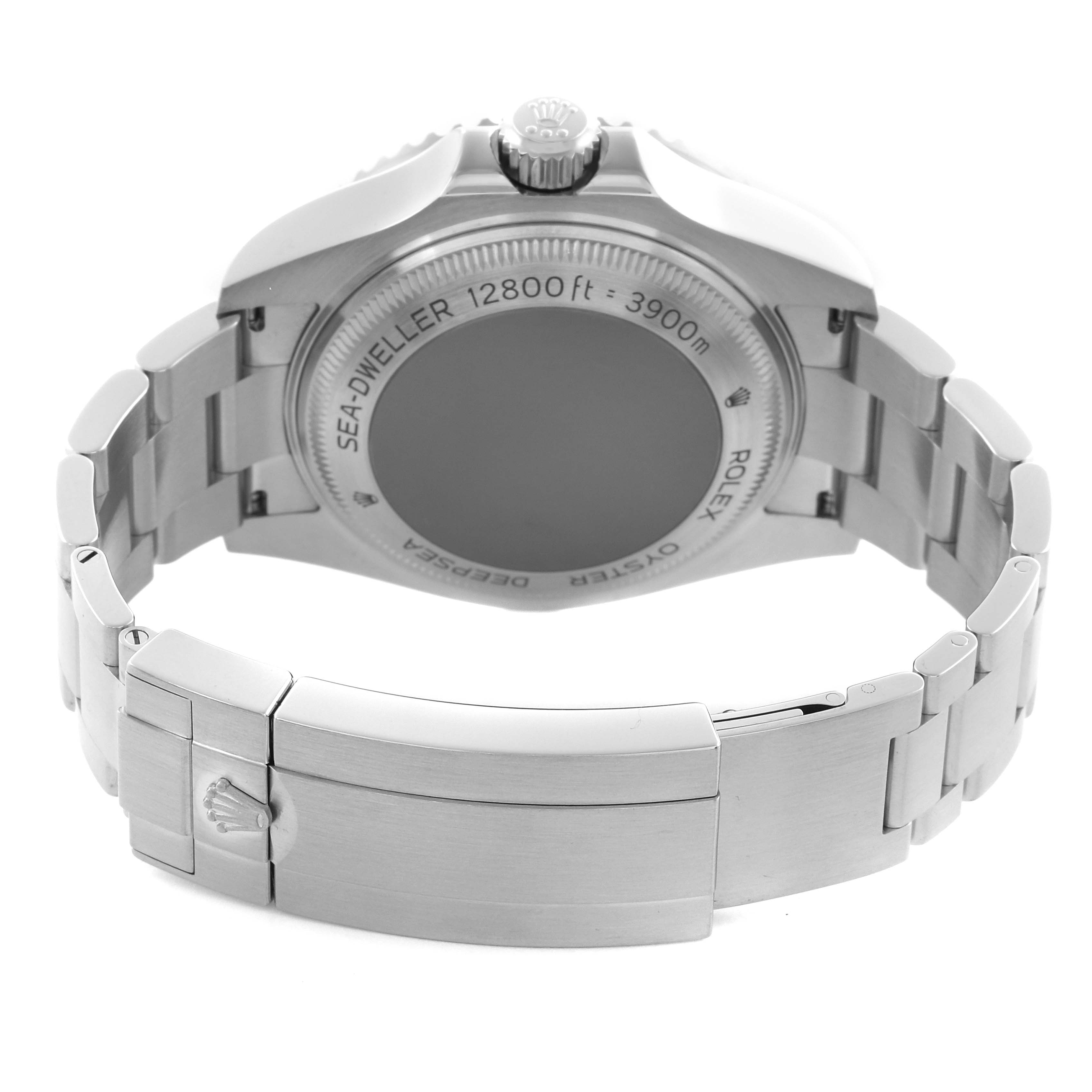 The Rolex Sea-Dweller 126660 Men's Stainless Steel Black Dial 126660 Men's Stainless Steel Black Dial watch is shown from the back, displaying the case back and bracelet clasp.