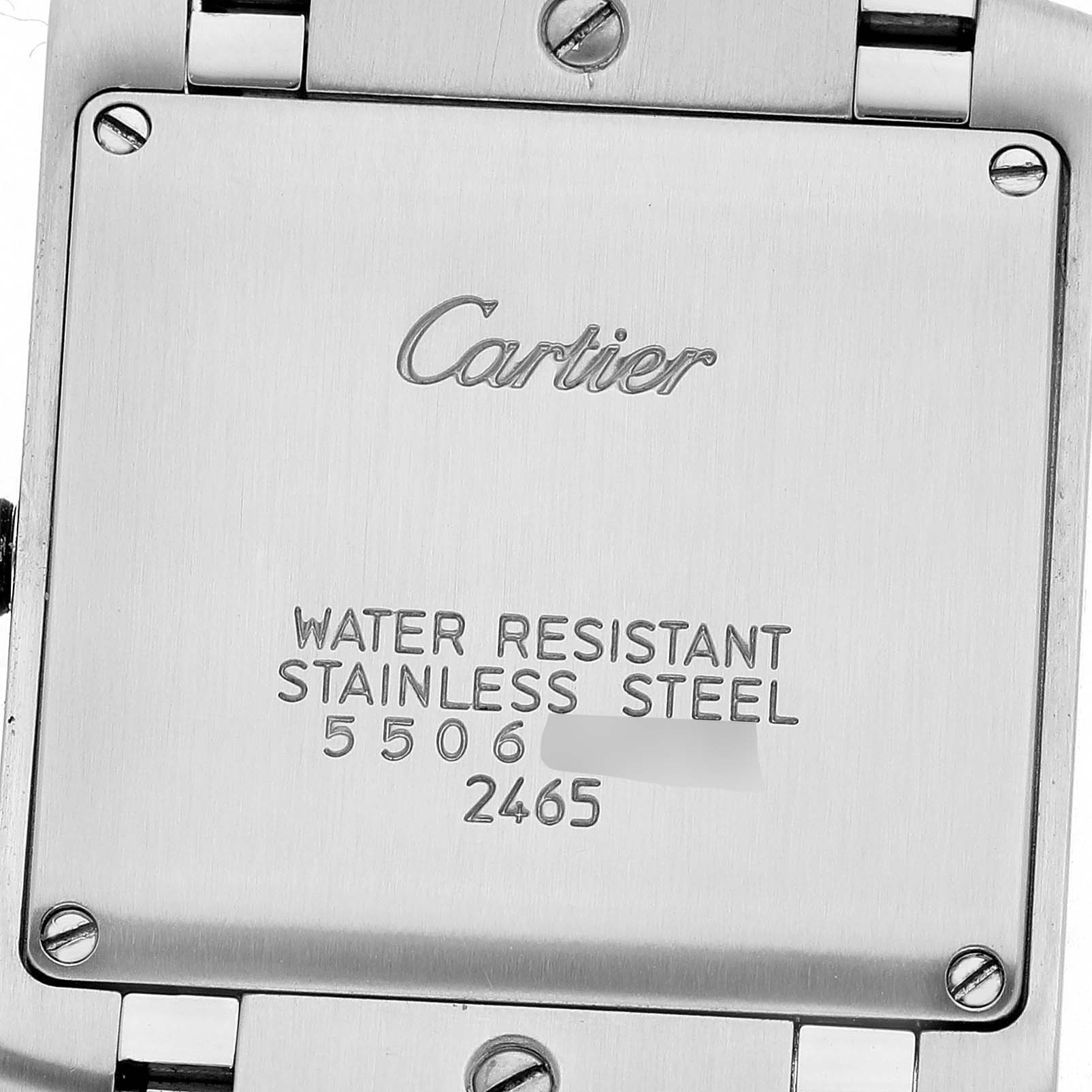 The image shows the back case of the Cartier Tank Française watch, featuring its branding, material, and serial numbers.