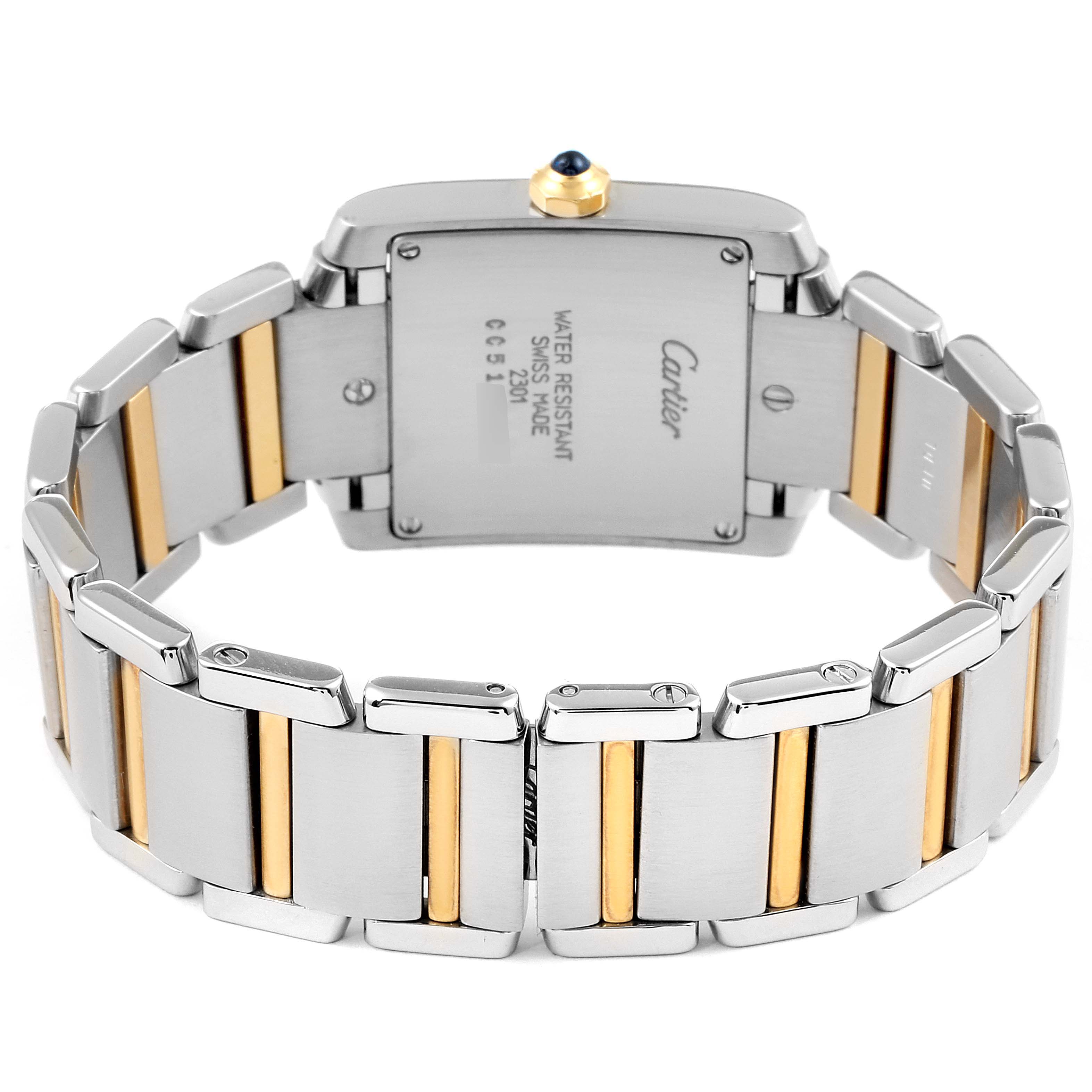 The Cartier Tank Francaise W2TA0003 Women's Steel and Gold (two tone) Silver Dial W2TA0003 Women's Steel and Gold (two tone) Silver Dial watch is shown from the back, highlighting its stainless steel and gold bracelet and case back.